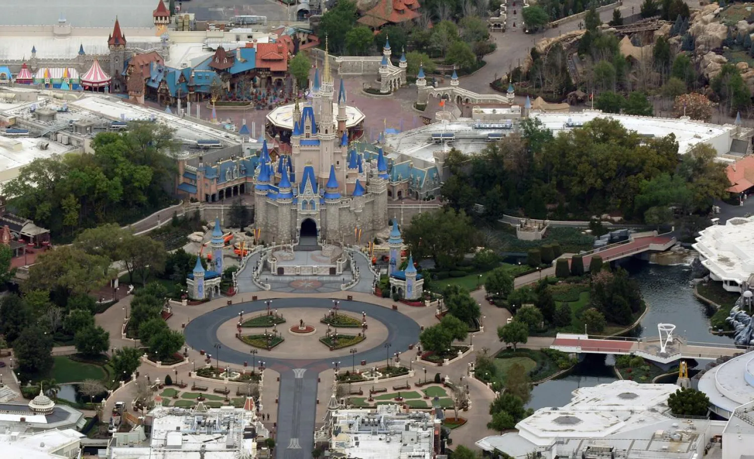 FILE PHOTO: Cinderella Castle is seen at the end of an empty Main Street at Disney's Magic Kingdom theme park after it closed in an effort to combat the spread of coronavirus disease (COVID-19), in an aerial view in Orlando, Florida, US March 16, 2020. REUTERS/Gregg Newton