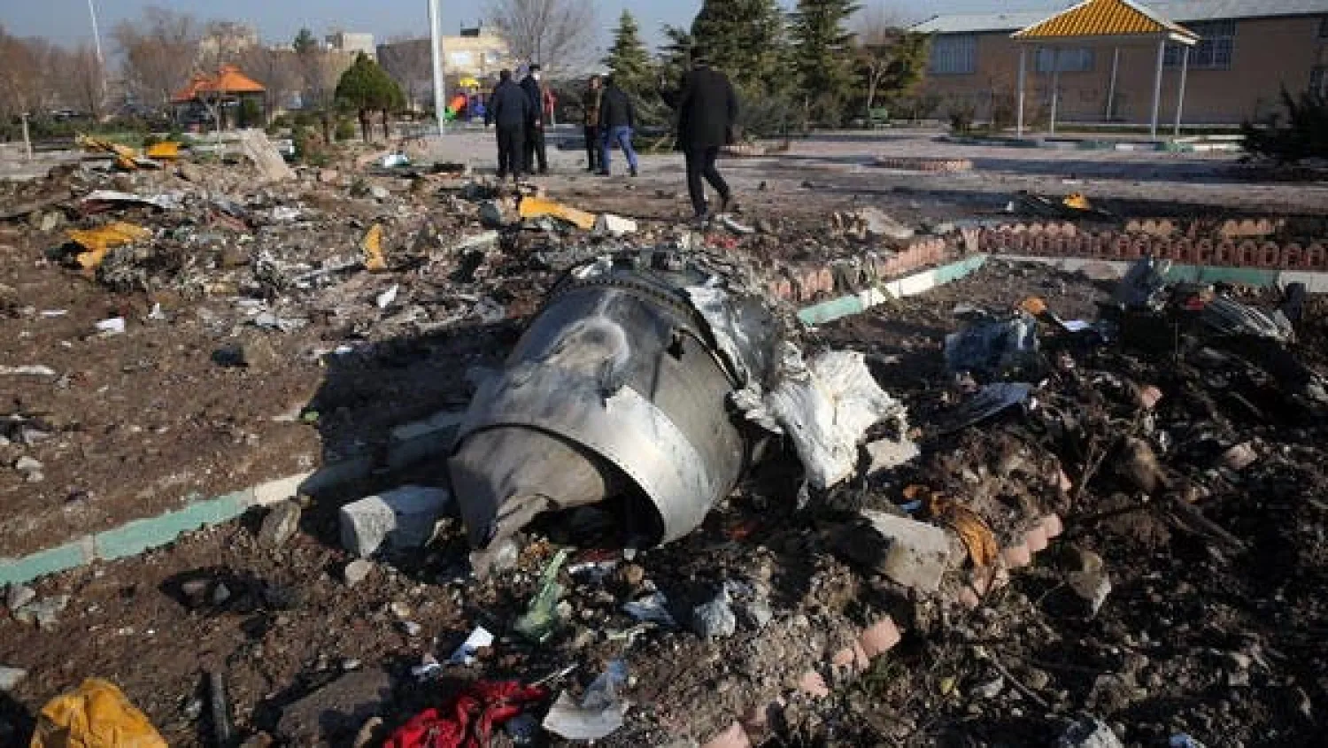 Rescue teams work amidst debris after a Ukrainian plane crashed near Imam Khomeini airport in Tehran. (File photo: AFP)
