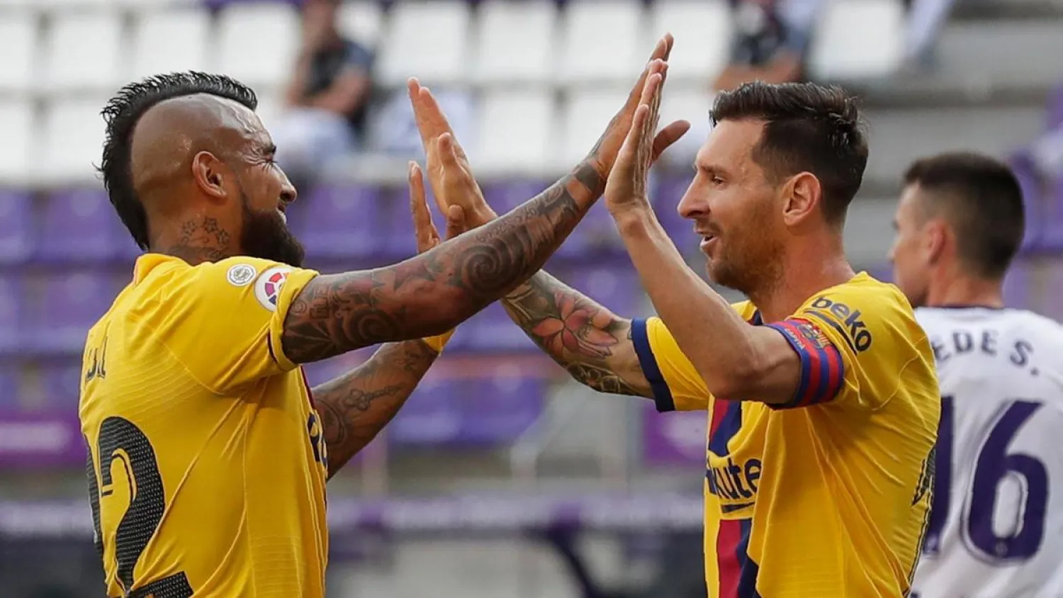 Barcelona's Arturo Vidal celebrates with his teammate Lionel Messi. (AP)