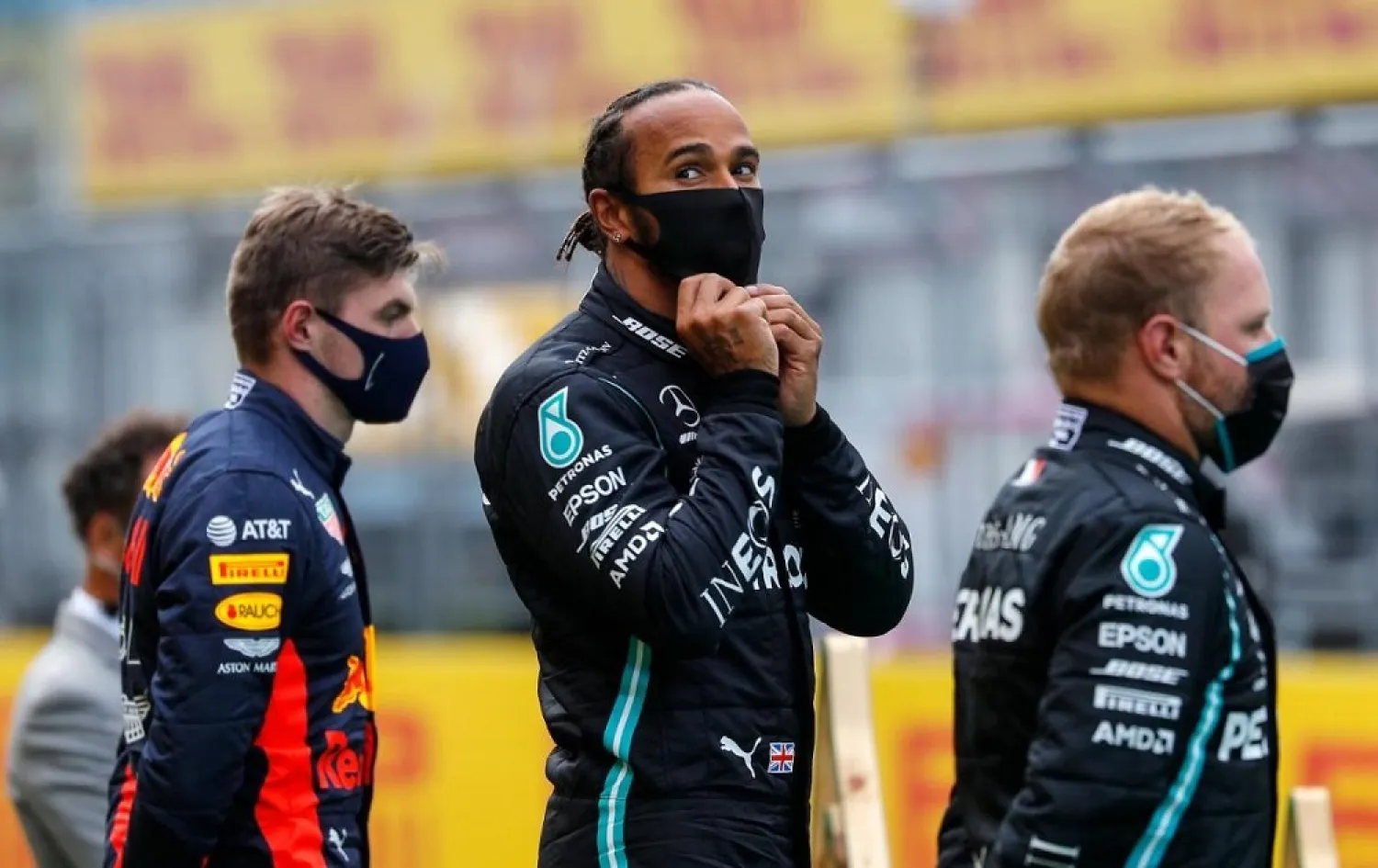 Mercedes driver Lewis Hamilton of Britain, center, stands on the podium after winning the Styrian F1 Grand Prix race at the Red Bull Ring racetrack in Spielberg, Austria, July 12, 2020. (AP)