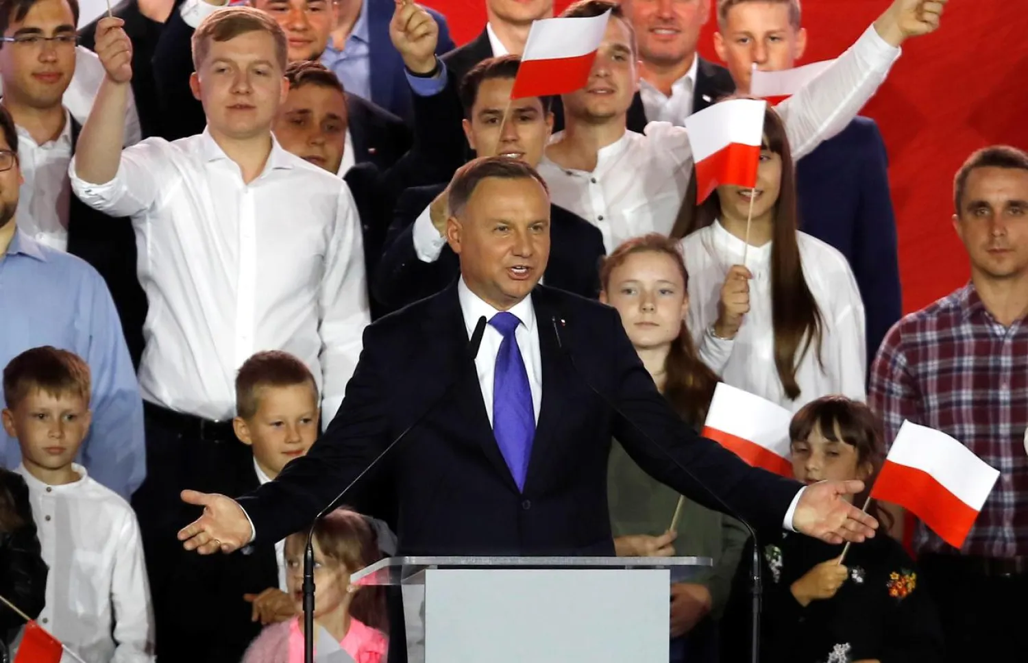 Polish President Andrzej Duda speaks after the announcement of the first exit poll results on the second round of the presidential election in Pultusk, Poland, July 12, 2020. (Reuters)