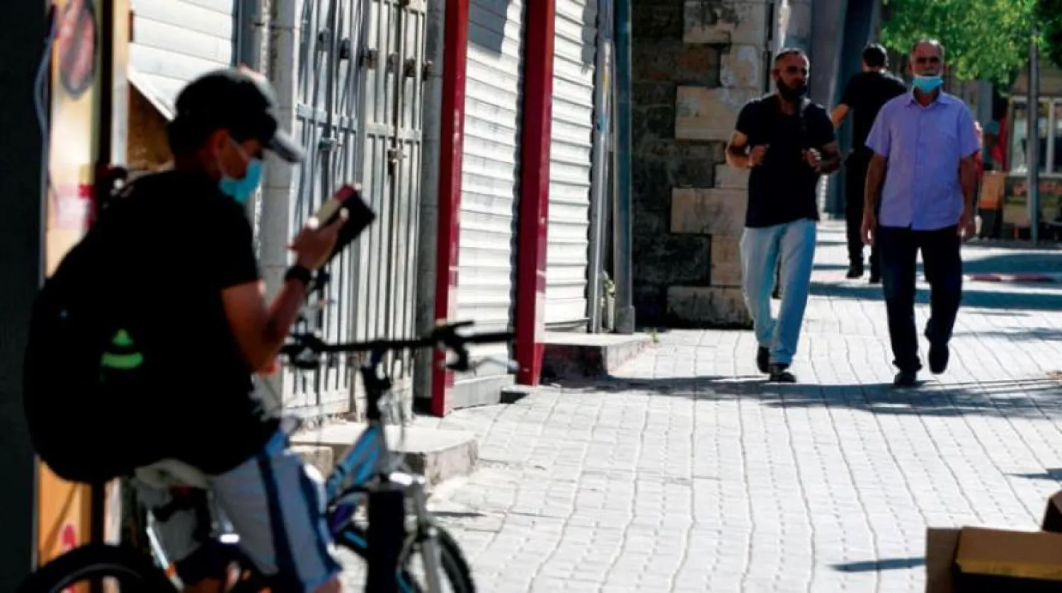 Filistin’deki salgının kötüleşmesi sebebiyle Ramallah’taki çarşılar kapandı. (AFP)