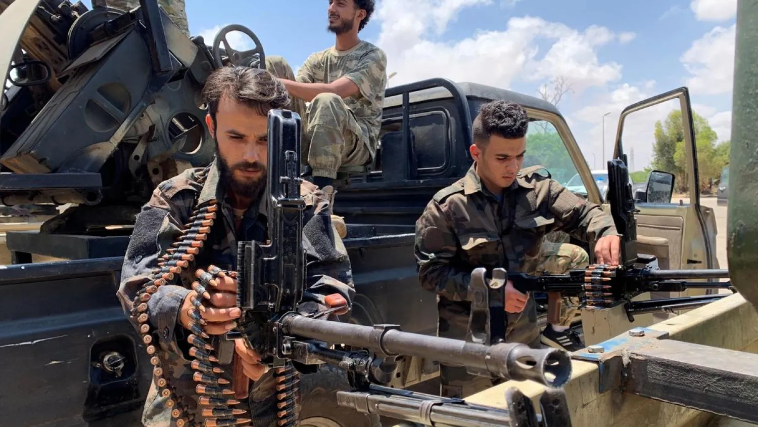 Troops loyal to Libya's GNA prepare themselves in Tripoli before heading to Sirte, Libya. (Reuters)