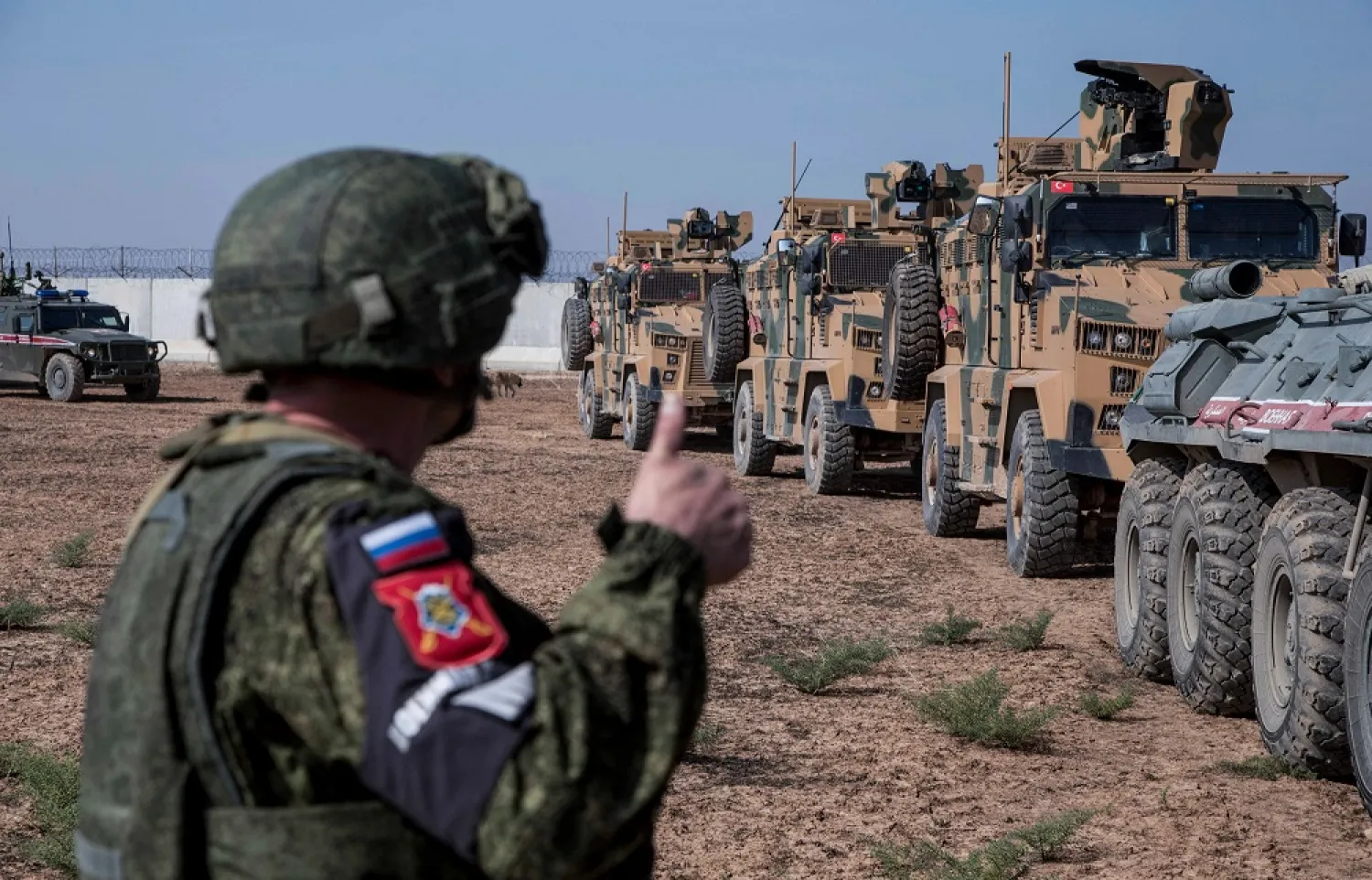 Turkish and Russian patrol is seen near the town of Darbasiyah, Syria, Nov. 1, 2019. (AP)