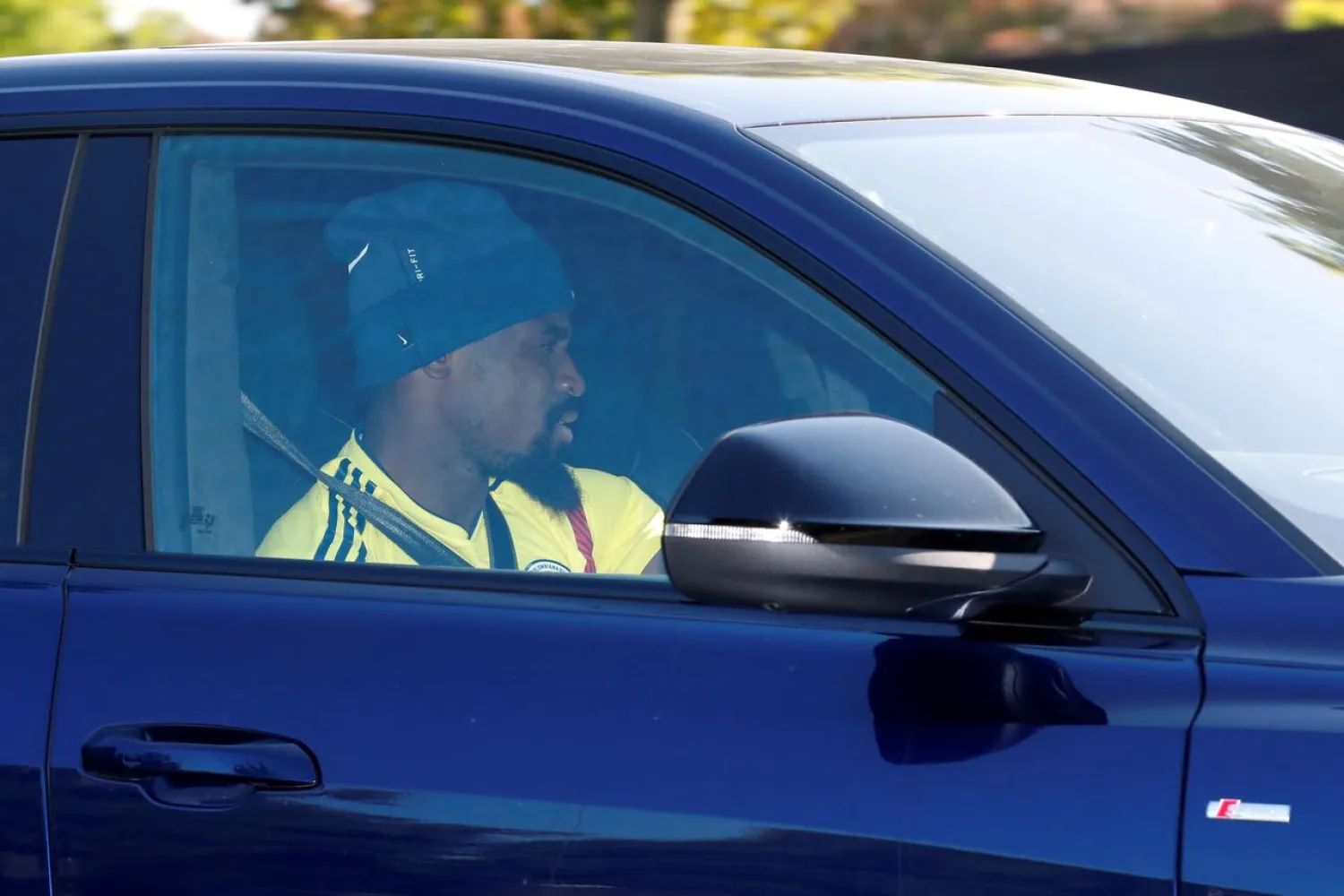 Tottenham Hotspur's Serge Aurier leaves the Tottenham Hotspur training center following the outbreak of the coronavirus disease (COVID-19), London, Britain, May 19, 2020. REUTERS/Andrew Boyers