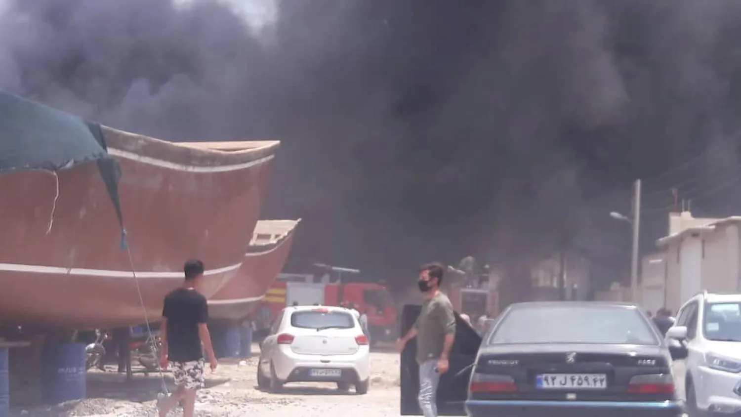 Smoke rises from ships that are burning at the Iranian port of Bushehr, Iran, July 15, 2020. (WANA via Reuters)
