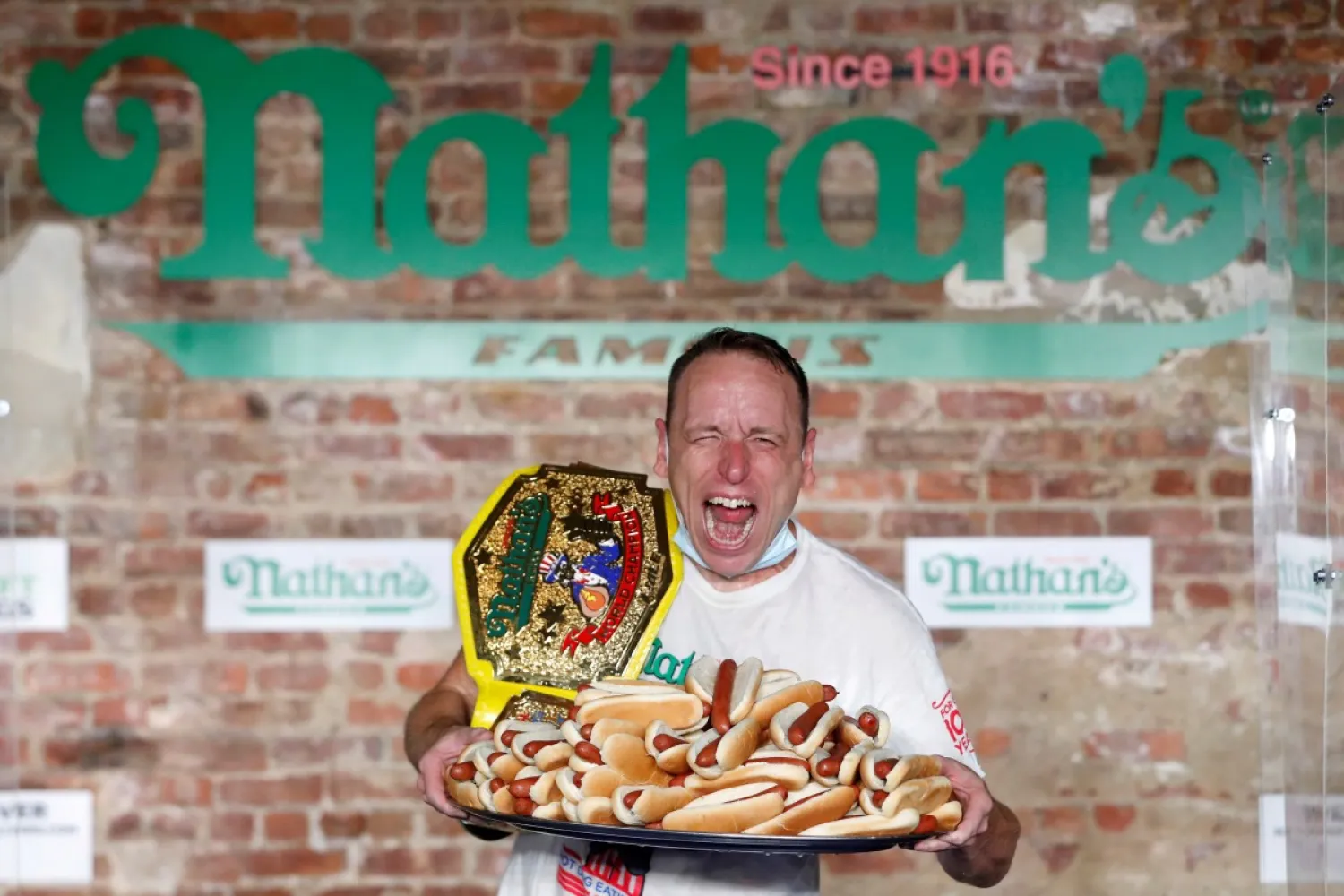 Joey Chestnut after winning the contest. Photo: Reuters
