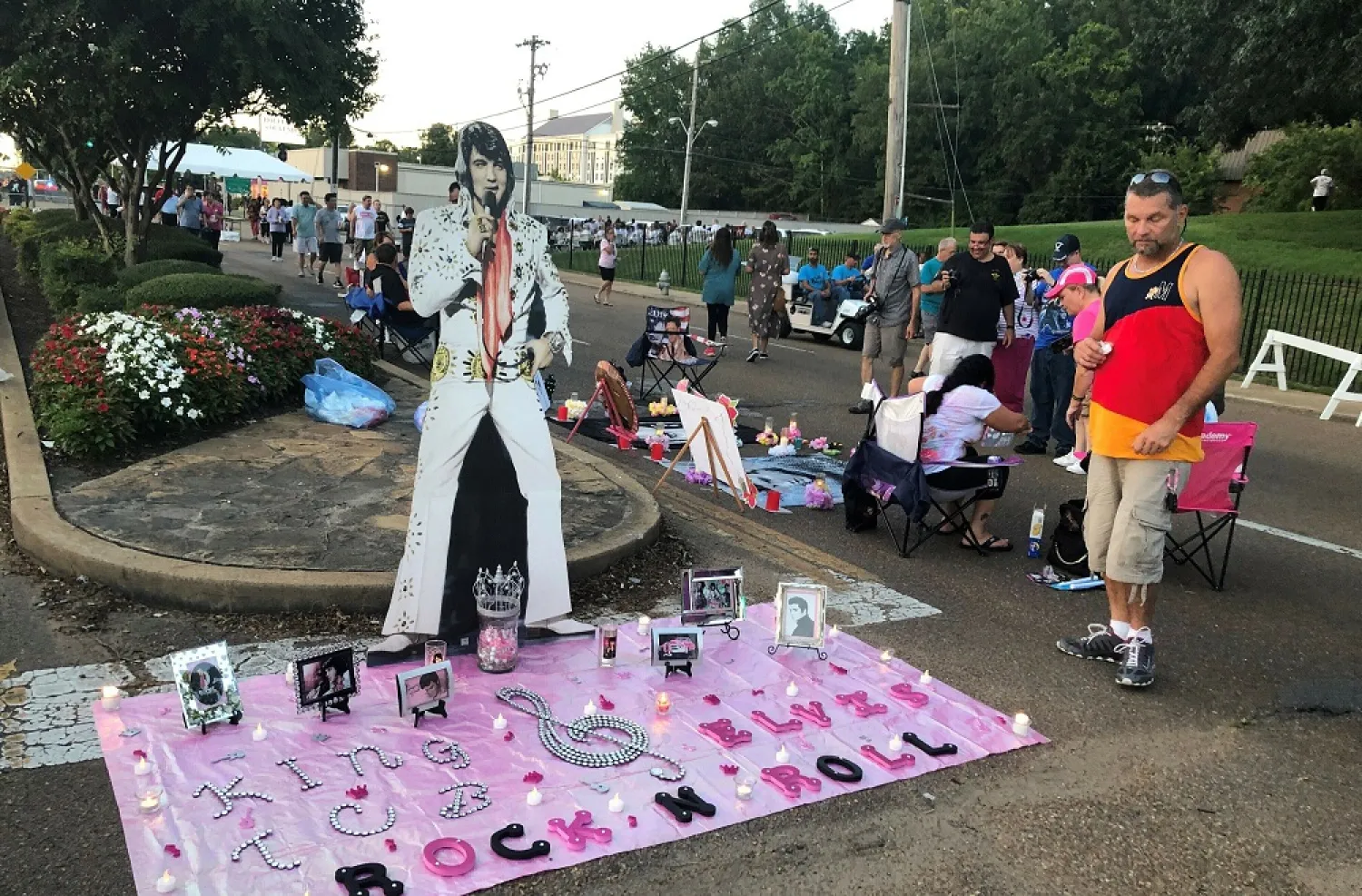 In this Aug. 15, 2019, file photo, a street art display honoring Elvis Presley is shown at a candlelight vigil at Graceland in Memphis, that commemorates his death. (AP)