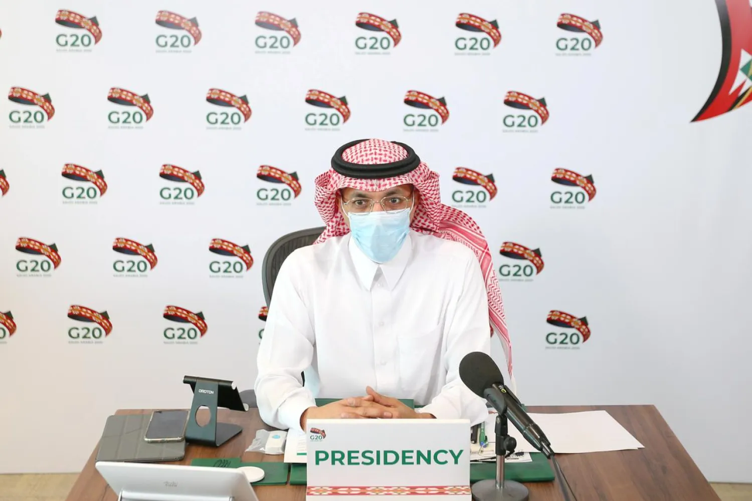 Saudi Minister of Finance Mohammed al-Jadaan wears a protective mask as he attends a virtual meeting of G20 finance ministers and central bank governors in Riyadh, Saudi Arabia July 18, 2020. (Reuters)