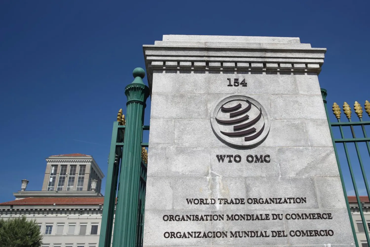 A logo is pictured on the headquarters of the World Trade Organization (WTO) in Geneva, Switzerland, June 2, 2020. REUTERS/Denis Balibouse/File Photo