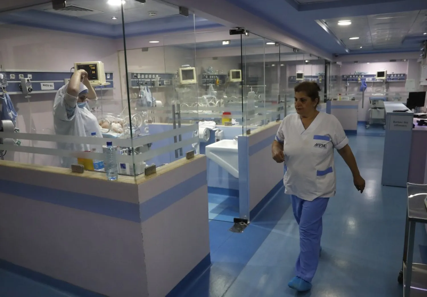 Nurses work at the neonatal intensive care unit, at Family Medical Center, a private hospital facing financial difficulties, in Majdalaiya village, north Lebanon, July 16, 2020. (AP)