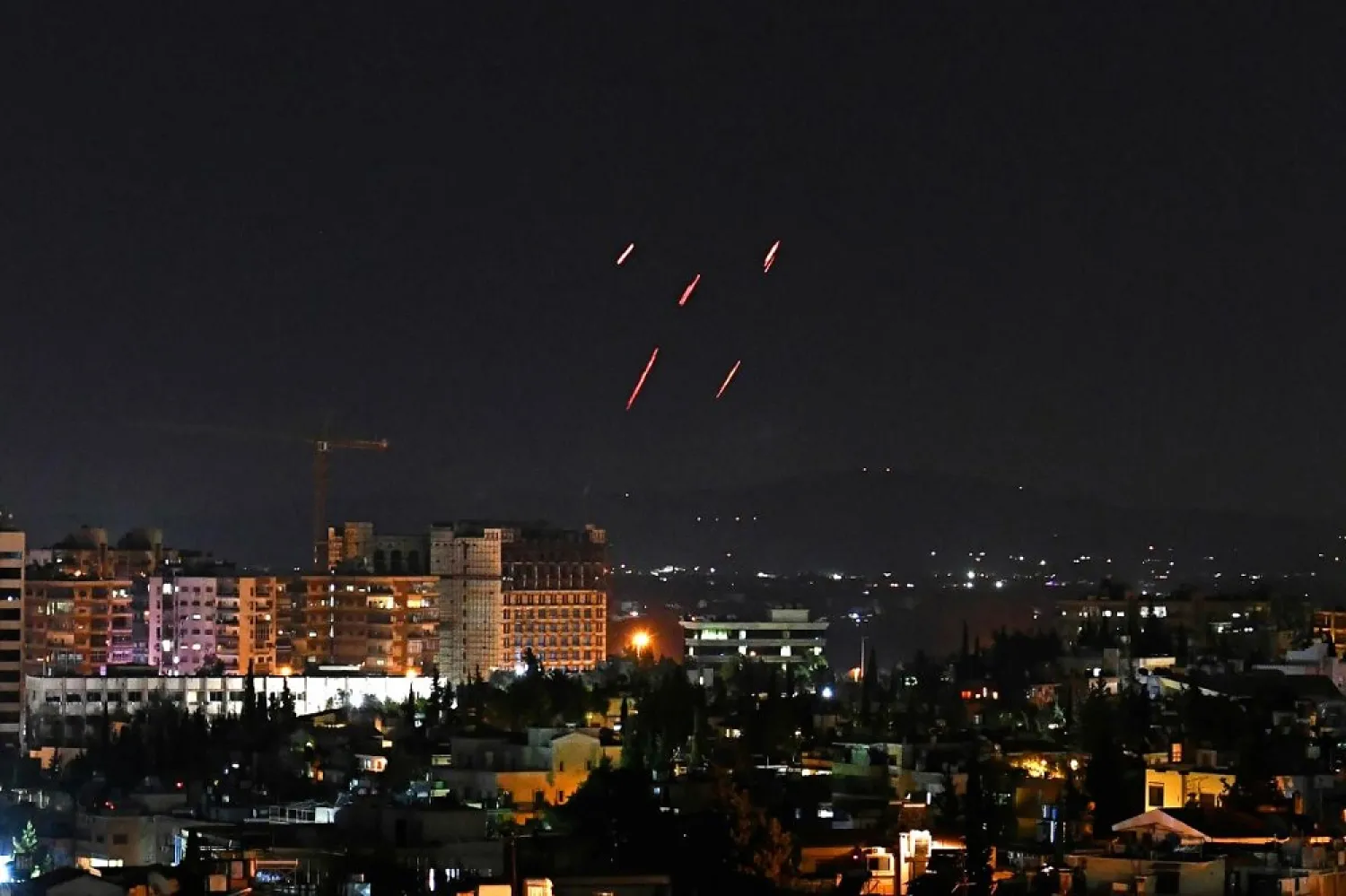 Syrian air defenses respond to Israeli missiles targeting south of the capital Damascus. (AFP)