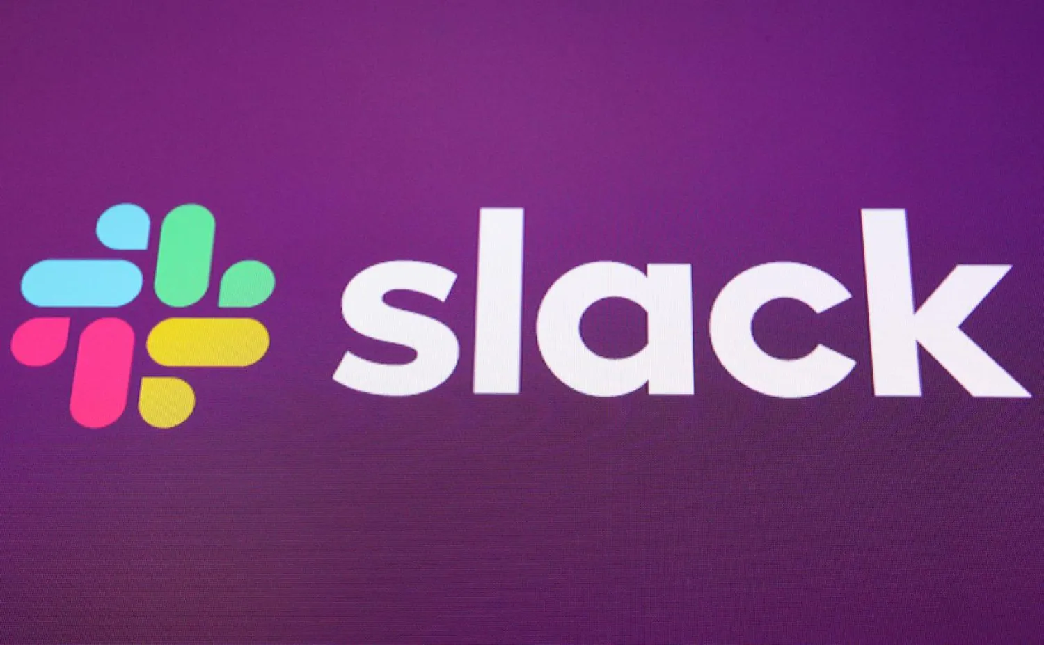 The Slack Technologies Inc. logo is seen at the New York Stock Exchange (NYSE) during the company's direct listing in New York, US June 20, 2019. (Reuters)