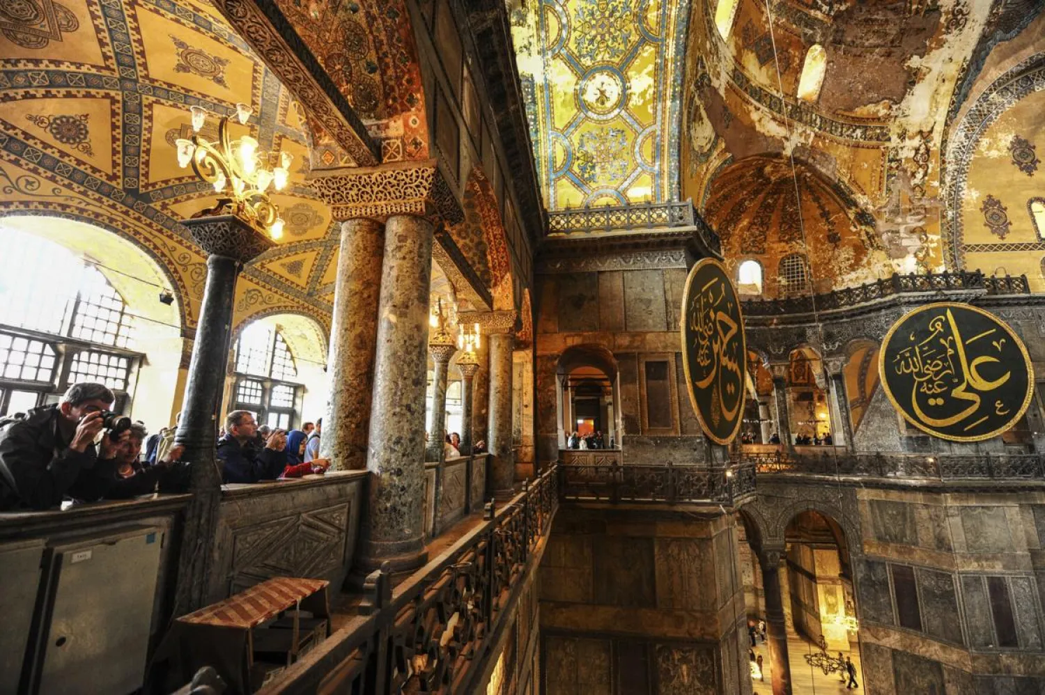 Visitors inside the Byzantine-era Hagia Sophia, in the historic Sultanahmet district of Istanbul, Friday, Oct. 15, 2010. (AP)