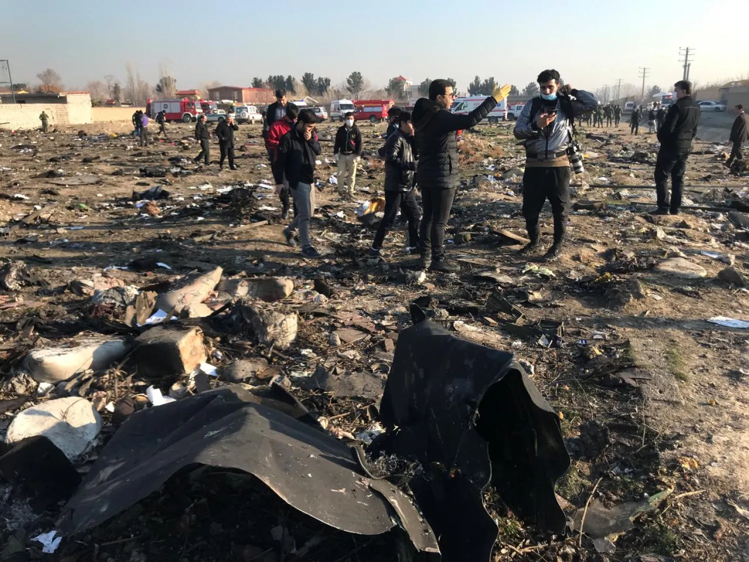 People check the debris from a plane crash belonging to Ukraine International Airlines after take-off from Iran, January 8, 2020. Nazanin Tabatabaee/WANA (West Asia News Agency) via REUTERS