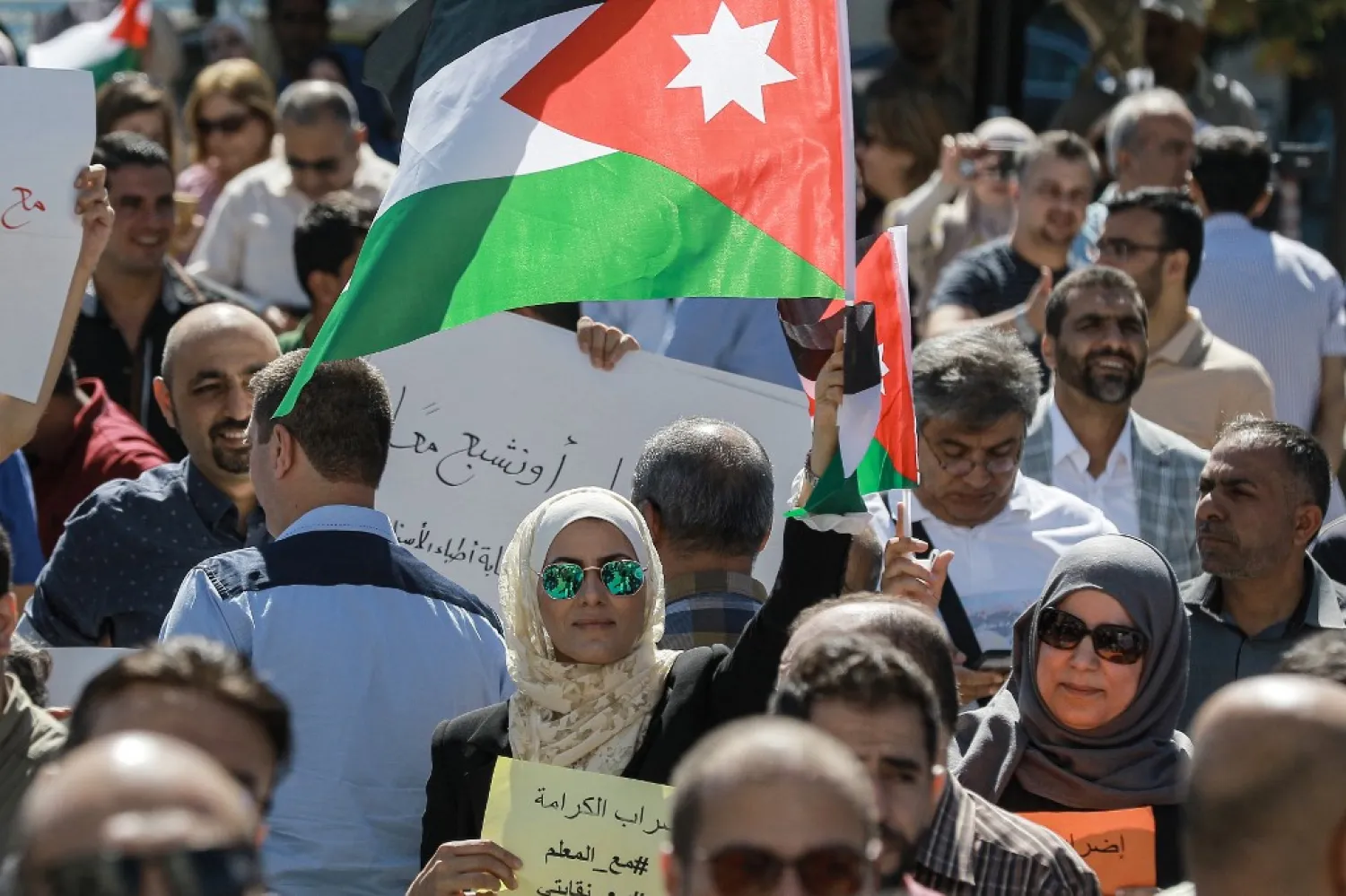 Public school teachers demand pay raises at a protest in Jordan's capital Amman on October 3, 2019. (AFP)