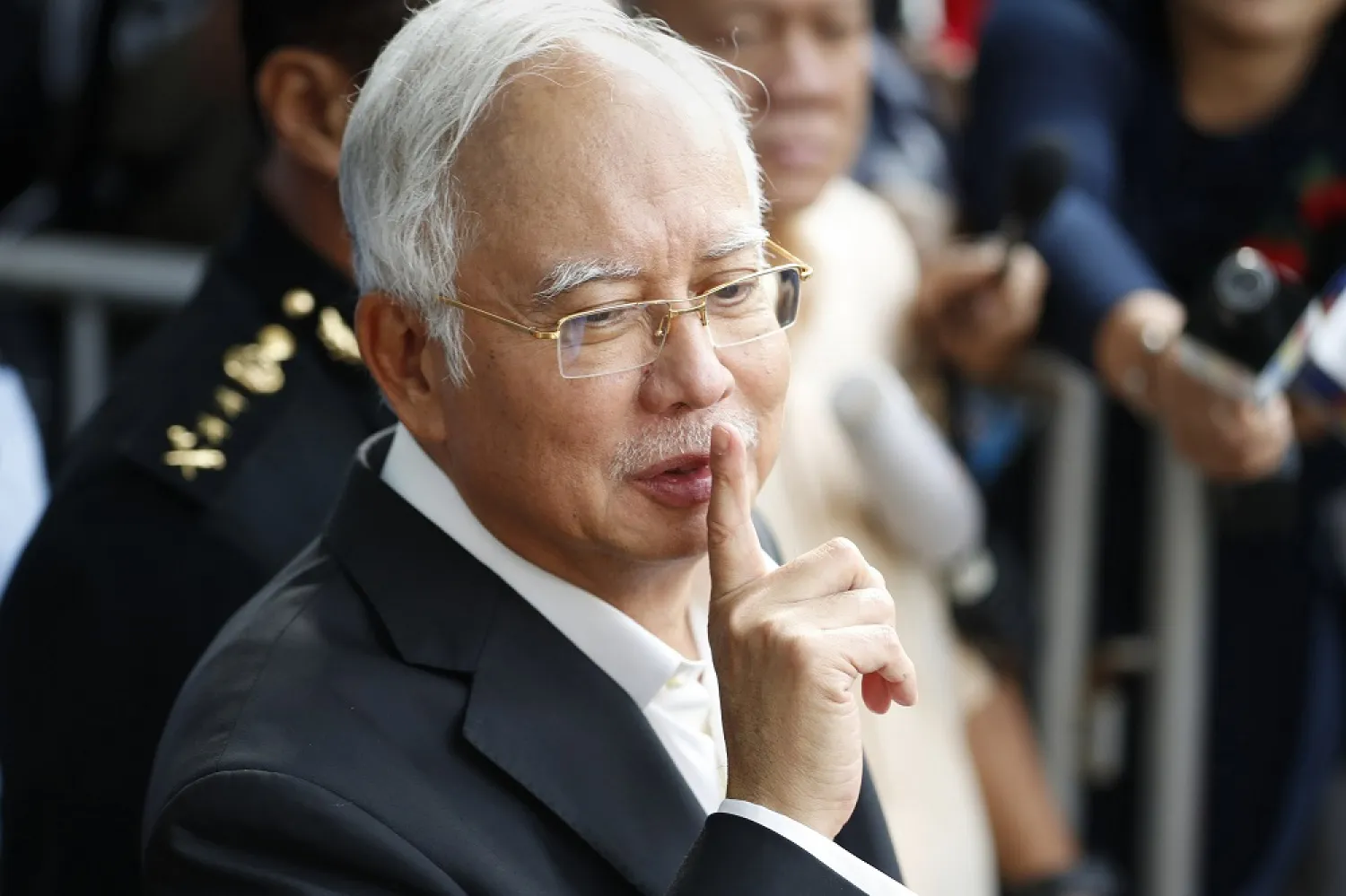 In this May 24, 2018, file photo, former Malaysian PM Najib Razak gestures as he leaves the Malaysian Anti-Corruption Commission (MACC) Office in Putrajaya, Malaysia. (AP)