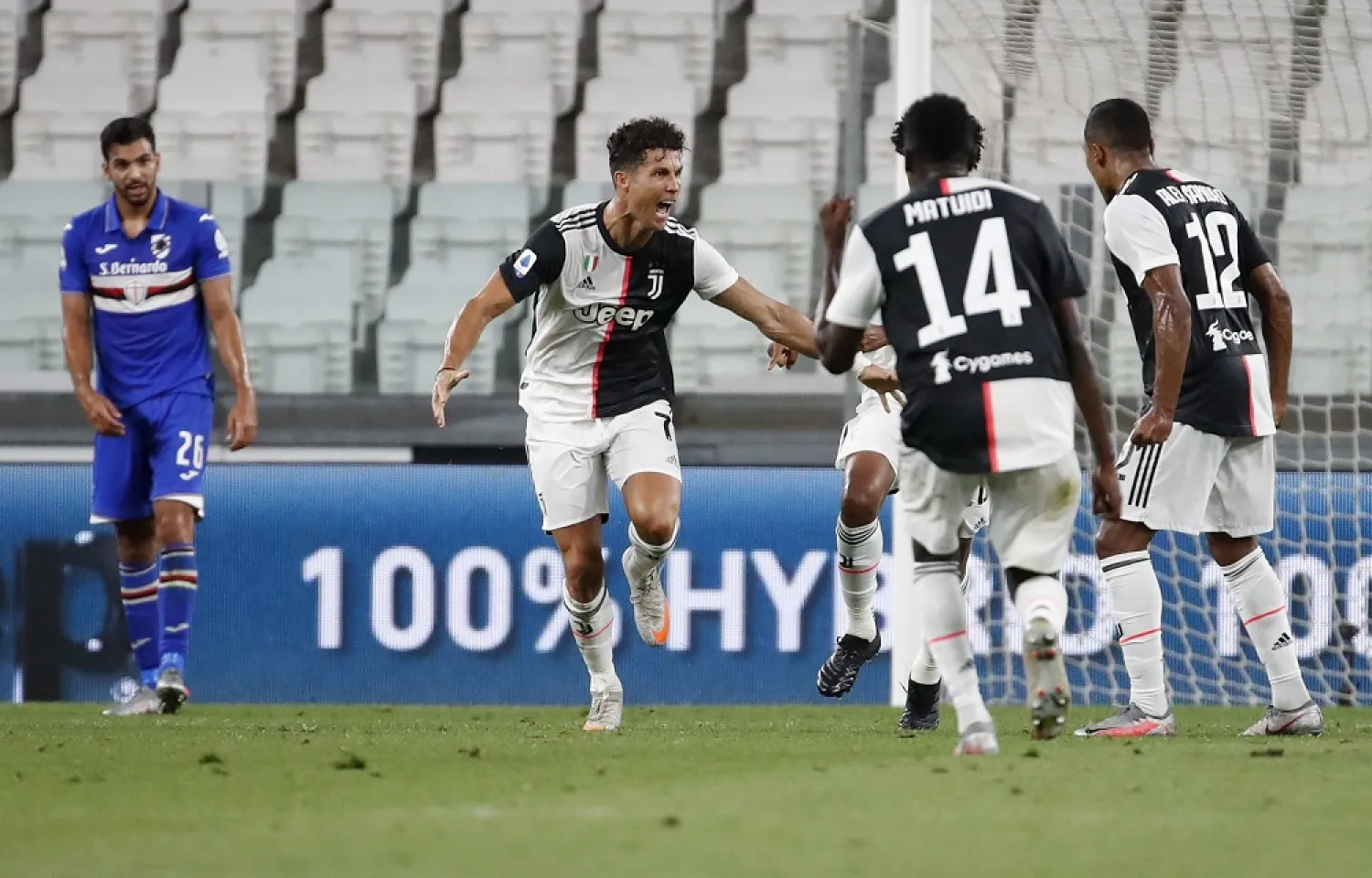 Juventus' Cristiano Ronaldo, second left, celebrates after scoring his team's first goal during the Serie A match against Sampdoria at the Allianz stadium in Turin, Italy, July 26, 2020. (AP)