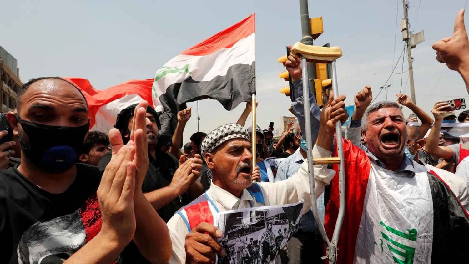 The funeral of a protester who was killed during anti-government protests at Tahrir Square in Baghdad about poor public services. (Reuters)