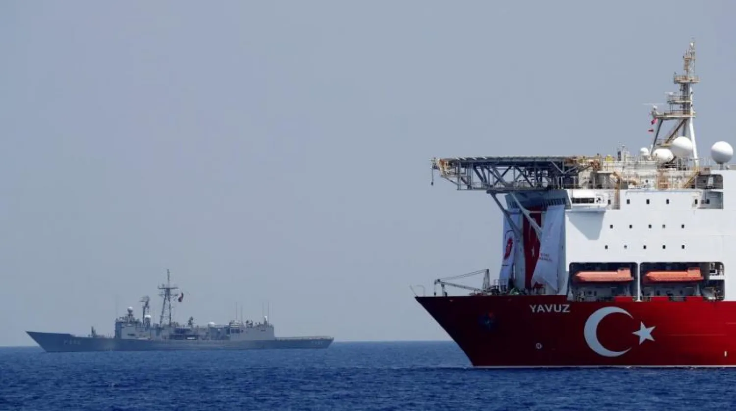 Turkish drilling vessel Yavuz is escorted by Turkish Navy frigate TCG Gemlik (F-492) in the eastern Mediterranean Sea off Cyprus, August 6, 2019. REUTERS/Murad Sezer
