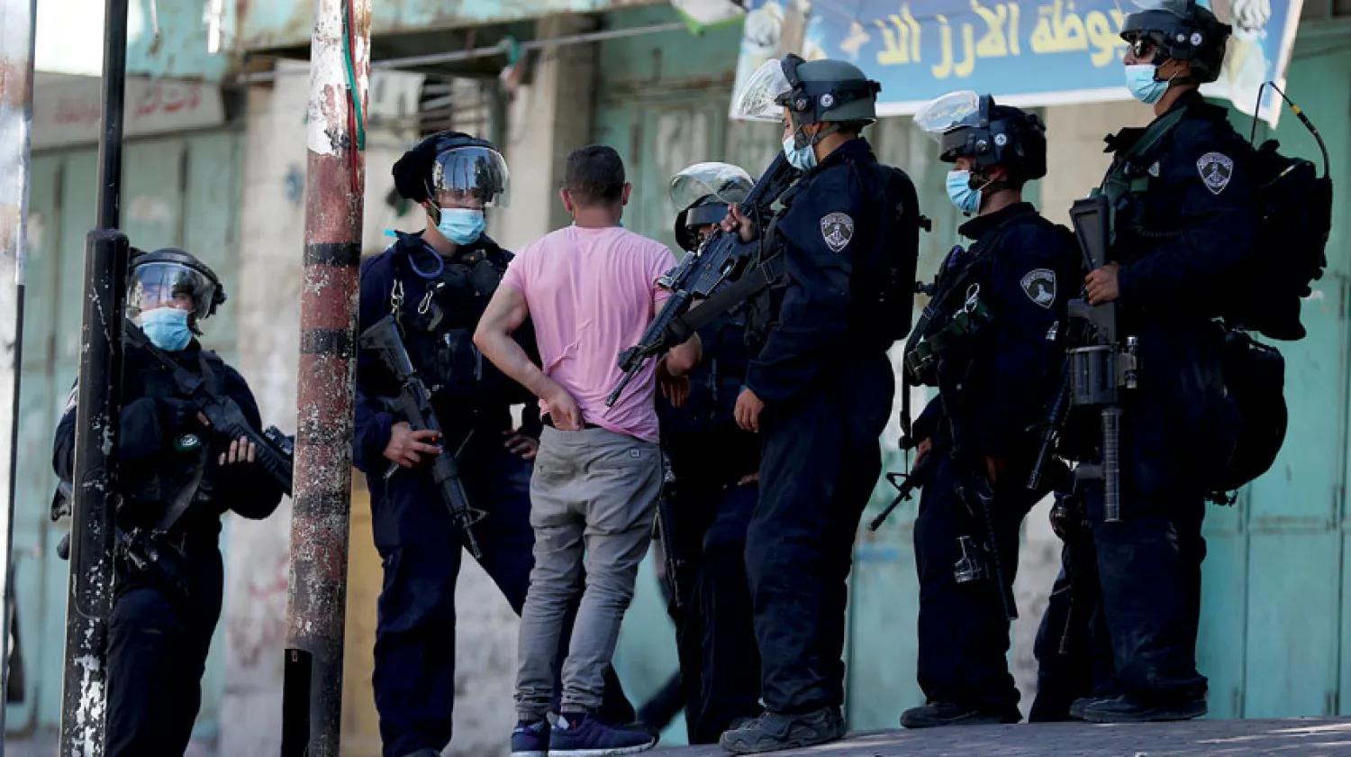 احتجاجات فلسطينية في الخليل ضد الخطة الإسرائيلية بضم جزء من أراضي الضفة (إ.ب.أ)