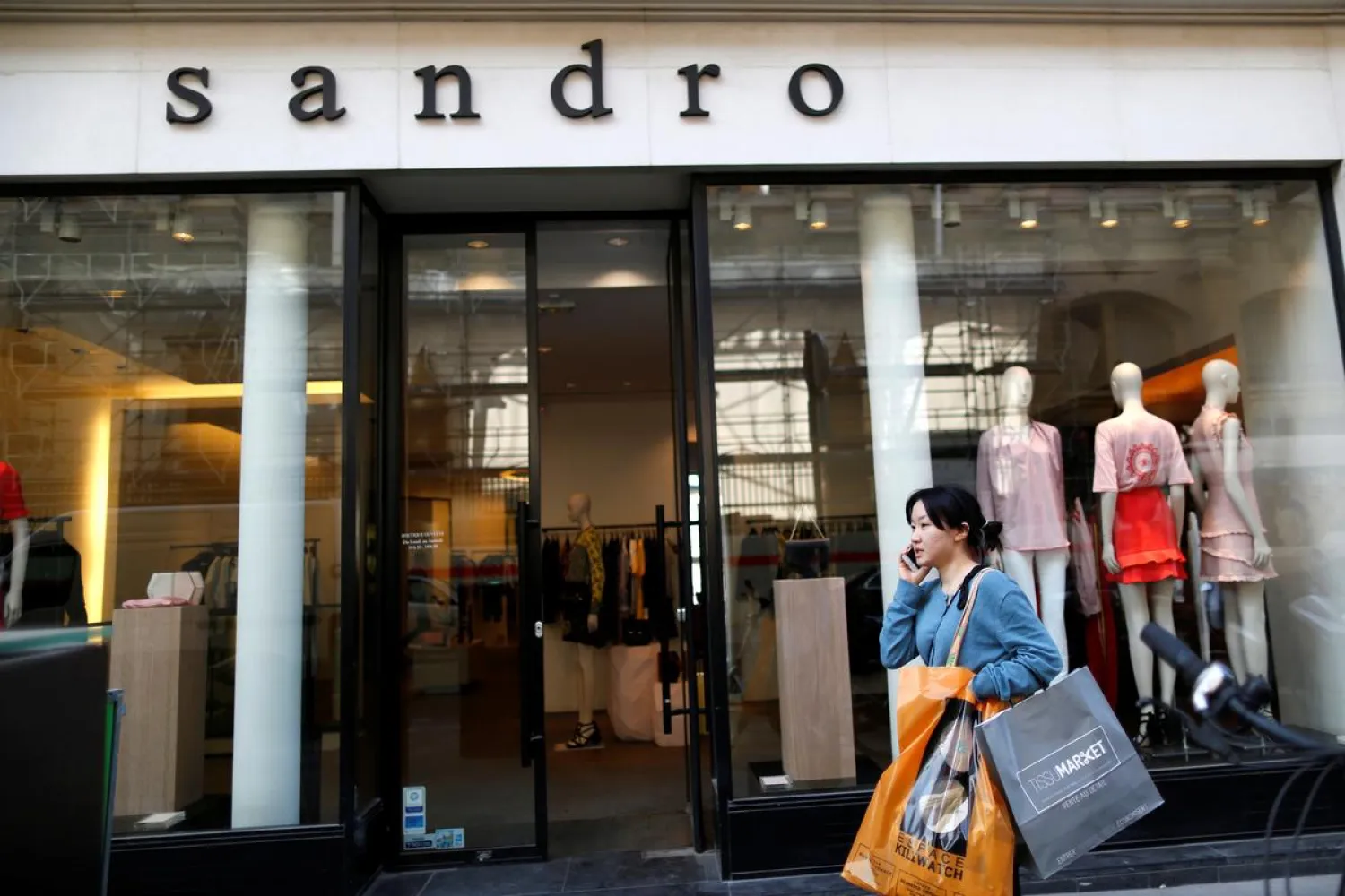 The logo of ready-to-wear Sandro brand is seen on a fashion shop storefront in Paris, France, March 29, 2017. (Reuters)