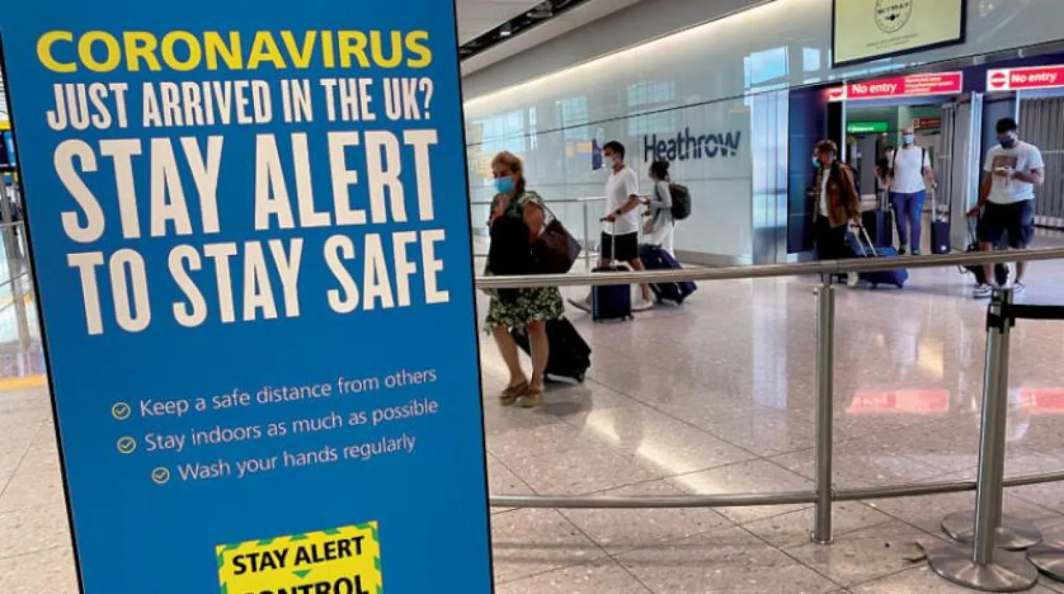  A message by the public health campaign for passengers arriving on international flights at Heathrow airport on Wednesday, July 29, 2020 (Reuters) 

 