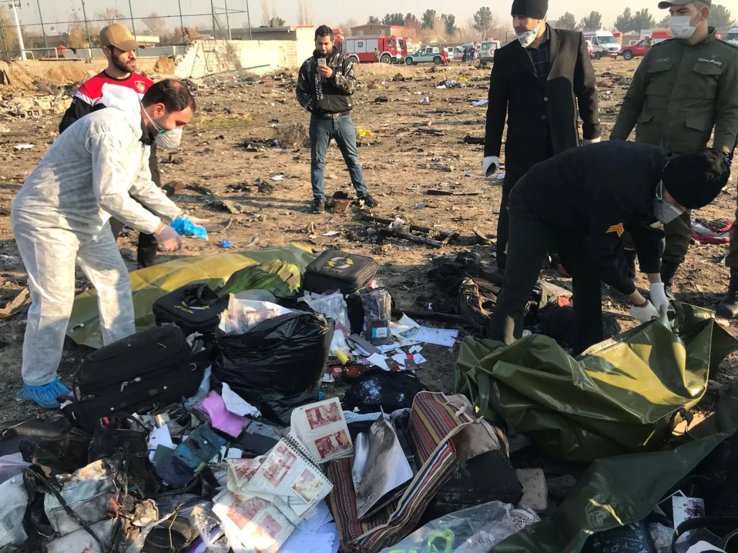 Passengers' belongings are seen after the Ukraine International Airlines plane crashed after take-off, on the outskirts of Tehran, Iran January 8, 2020. Nazanin Tabatabaee/WANA (West Asia News Agency) via REUTERS