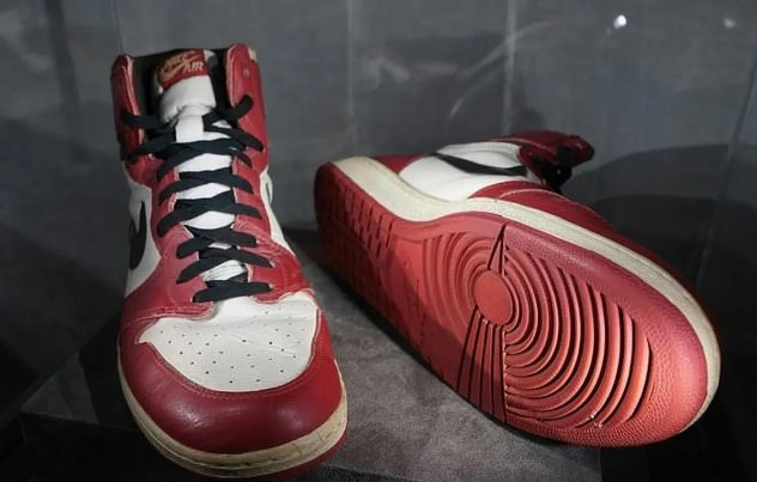 The Air Jordan 1 High, which Michael Jordan wore when he smashed the net's glass backboard during an exhibition game in Italy in 1985, are expected to sell for up to $850,000 at auction

