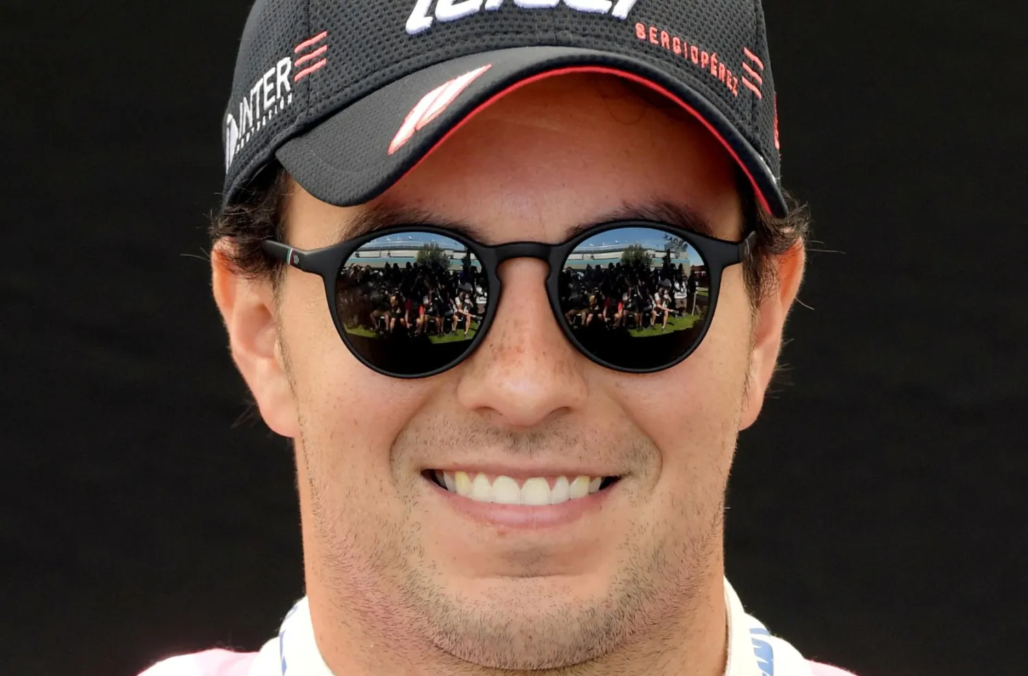FILE PHOTO: Formula One F1 - Australian Grand Prix - Melbourne Grand Prix Circuit, Melbourne, Australia - March 12, 2020 Racing Point's Sergio Perez poses for a drivers portrait REUTERS/Tracey Nearmy/File Photo