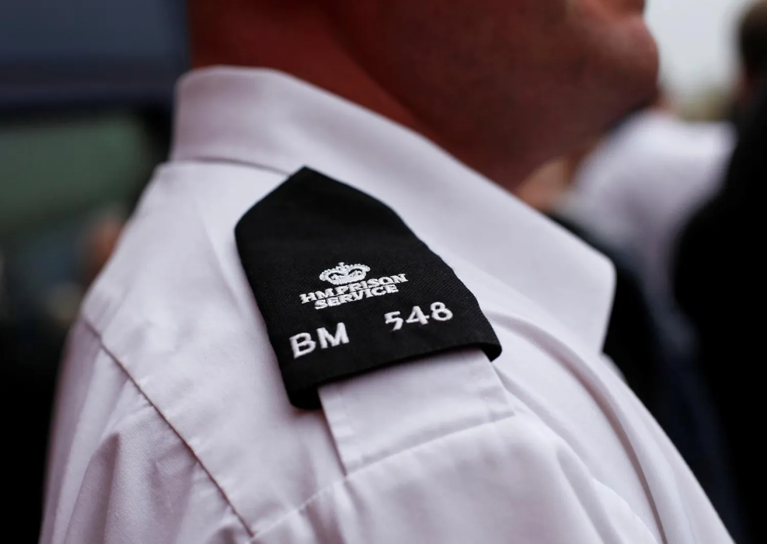 Prison officers attend a meeting outside Birmingham prison in central England April 1, 2011. (Reuters)