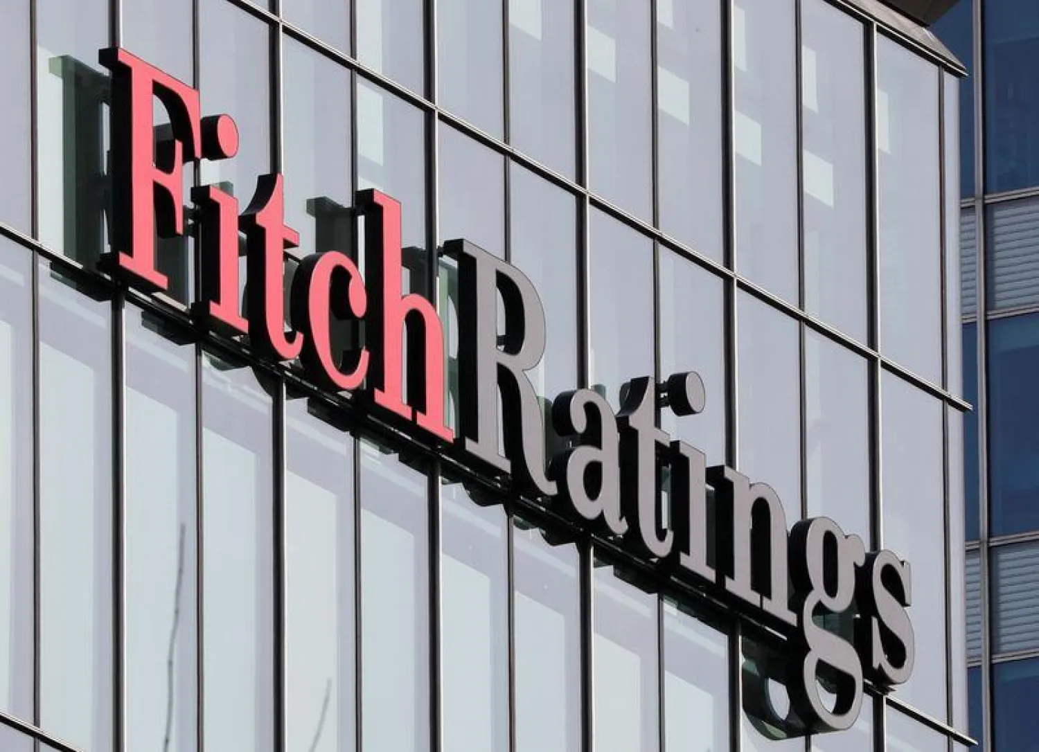 The Fitch Ratings logo is seen at their offices at Canary Wharf financial district in London,Britain, March 3, 2016. REUTERS/Reinhard Krause/File Photo
