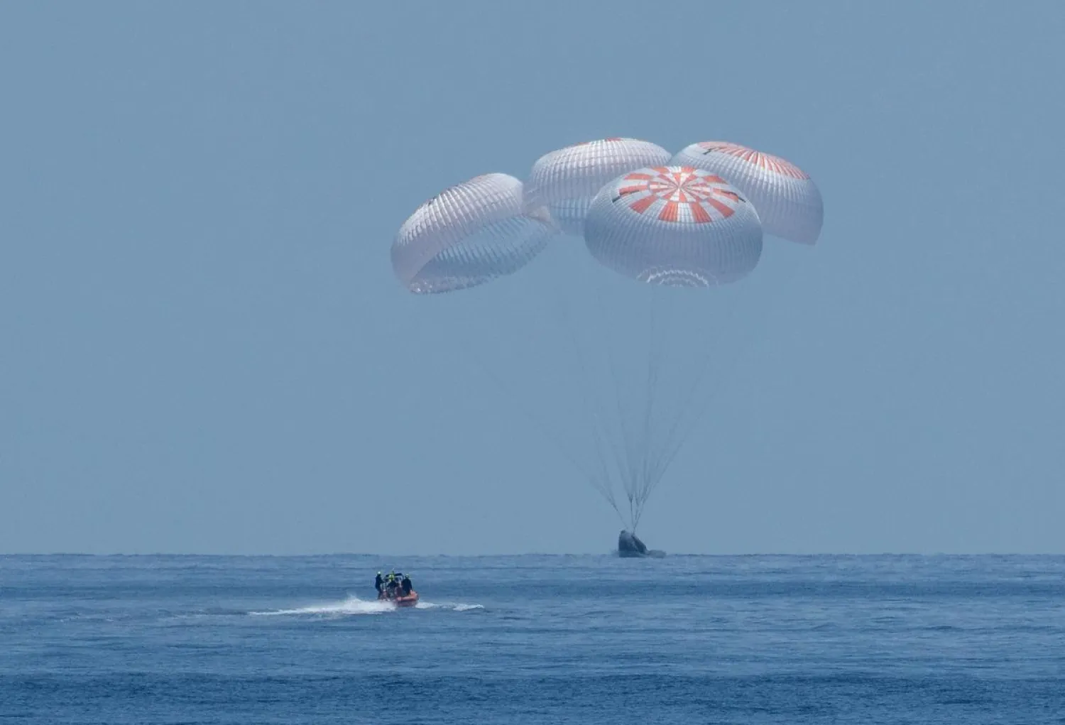 The SpaceX Crew Dragon Endeavour spacecraft lands in the Gulf of Mexico off the coast of Pensacola, Florida, US, August 2, 2020. (NASA via Reuters)