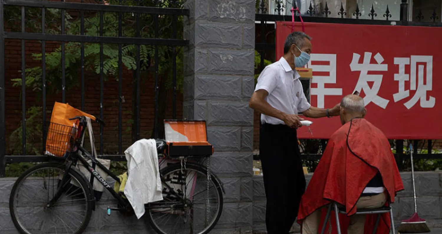 فريق «الصحة العالمية» يبحث منشأ «كورونا» في ووهان