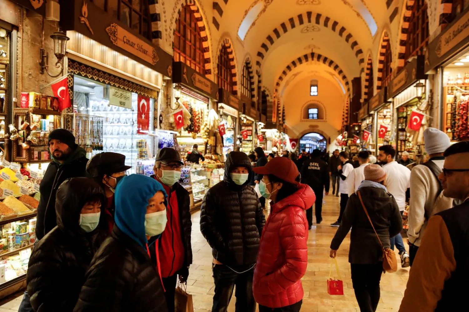 People wear protective face masks due to coronavirus concerns in Istanbul, Turkey March 16, 2020. REUTERS/Umit Bektas
