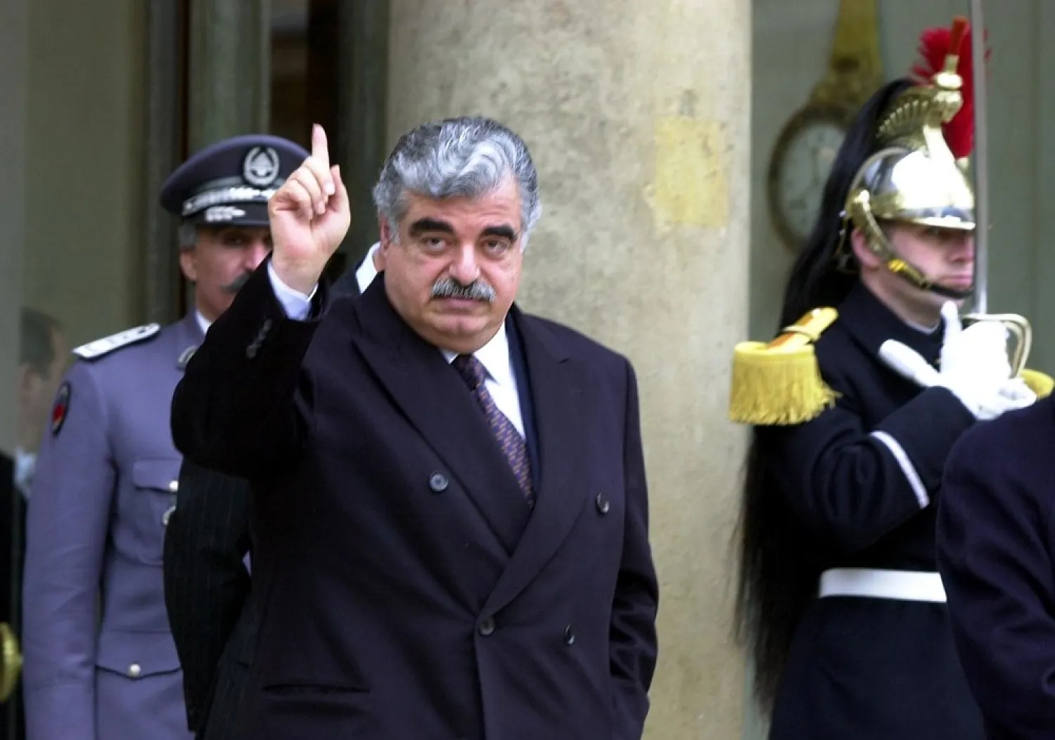 Lebanese Prime Minister Rafik Hariri leaves the Elysee Palace following a meeting with French President Jacques Chirac in Paris, France, February 27, 2001. (Reuters)