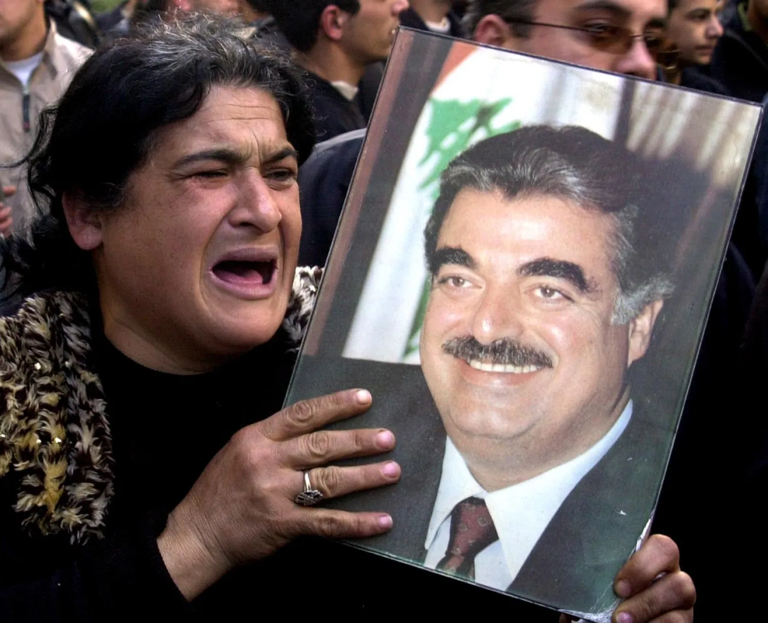 A Lebanese woman mourns following the assassination of former prime minister Rafik al-Hariri during a protest in Beirut, Lebanon, February 15, 2005. (Reuters)