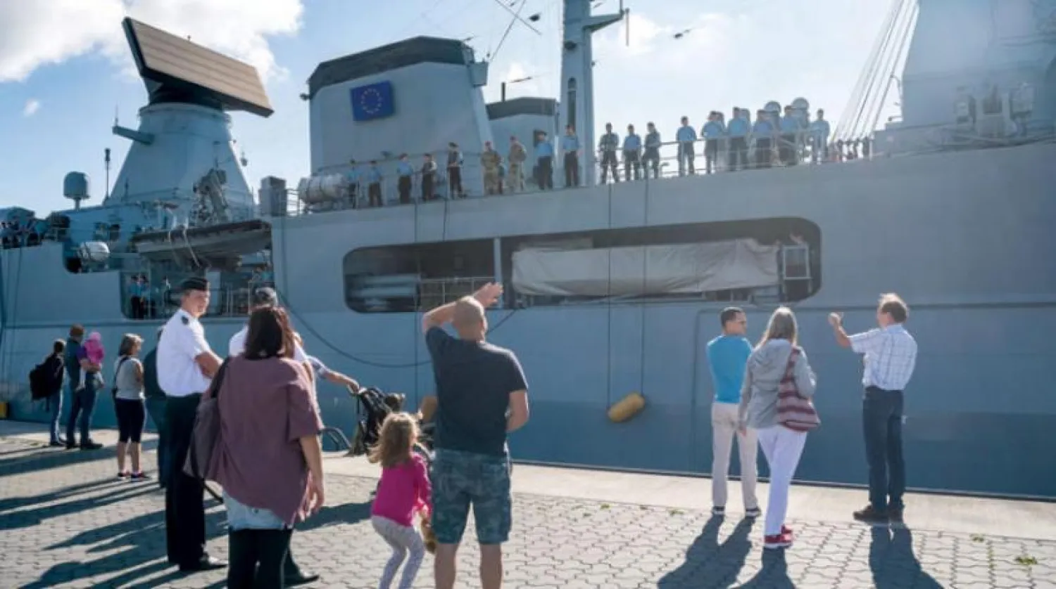 Members of the crew of the German frigate ‘Hamburg’ bid farewell to their families before leaving ‘Wilhelmshaven” port towards the waters opposite the Libyan shores on Tuesday, August 5, 2020 (DPA)  