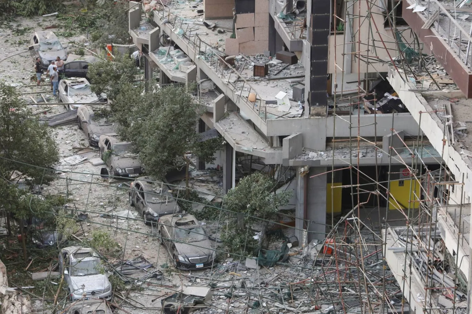 People inspect the damage near the site of Tuesday's blast in Beirut's port area, Lebanon. (Reuters)
