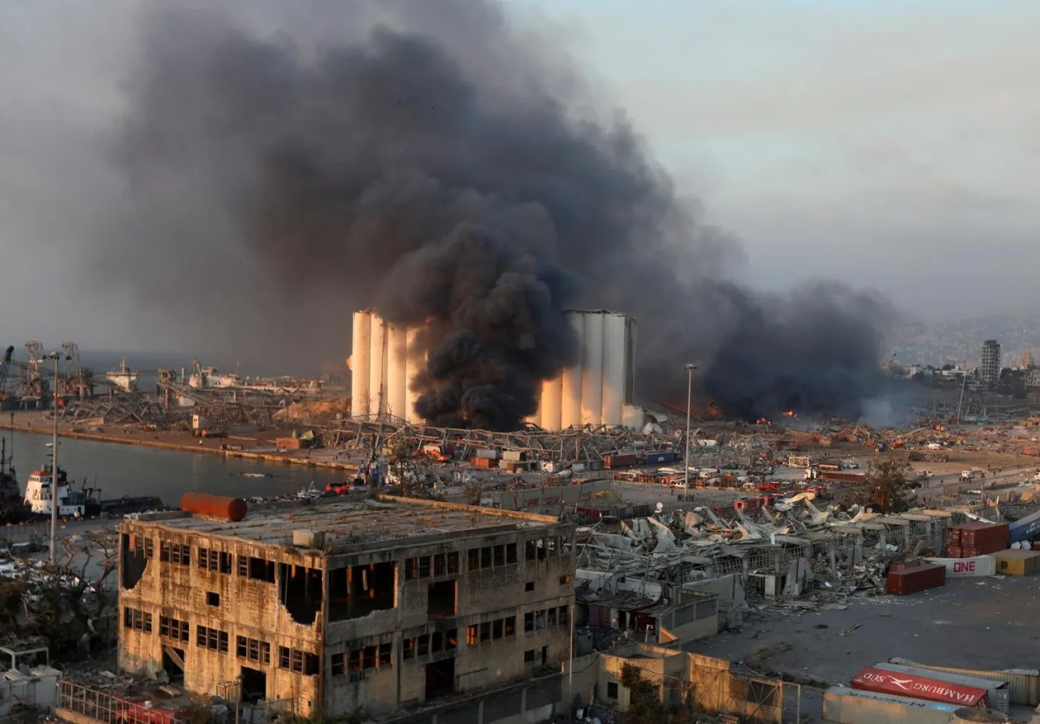 Smoke rises from the site of an explosion in Beirut's port area, Lebanon August 4, 2020. (Reuters)