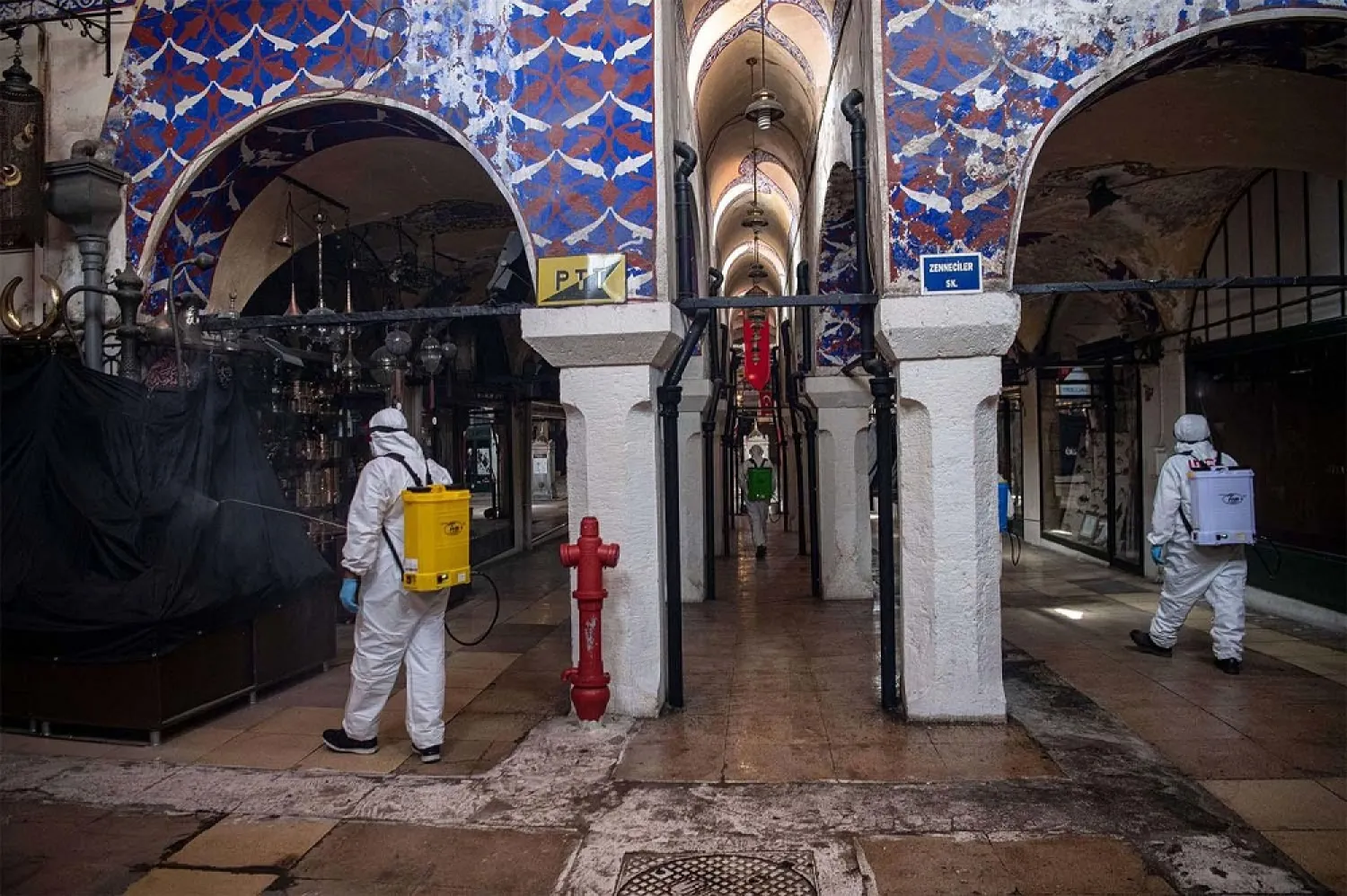 Volunteers disinfect Istanbul's Grand Bazaar. (AFP)