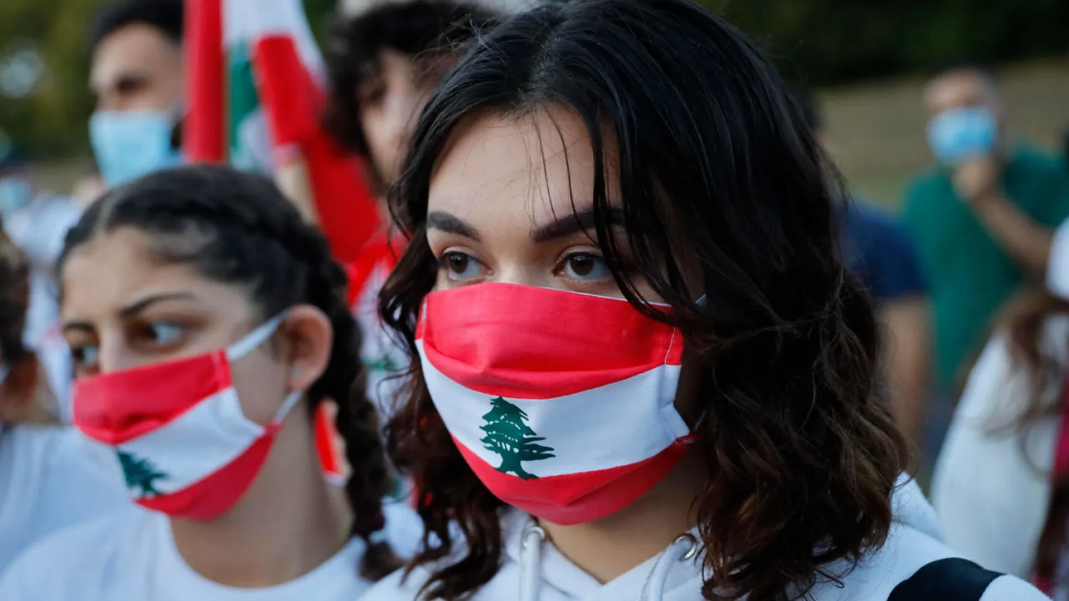Lebanese come together for a vigil held at Kensington gardens in central London to honour the victims of the Beirut blast on August 5, 2020.| AFP
