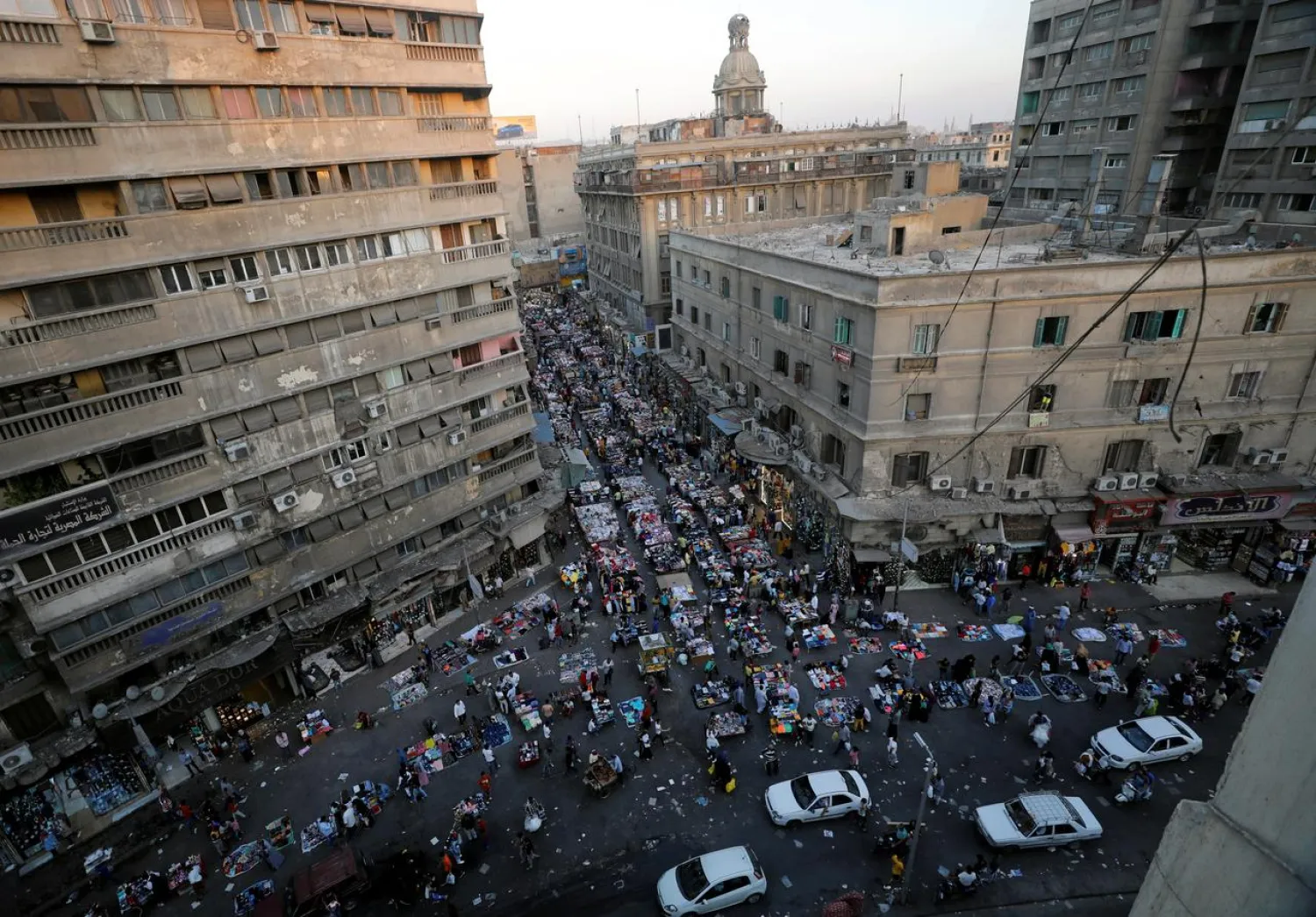 FILE PHOTO: A view shows a crowd and shops at Al Ataba market, following the coronavirus disease (COVID-19) outbreak, in Cairo, Egypt July 16, 2020. REUTERS/Mohamed Abd El Ghany