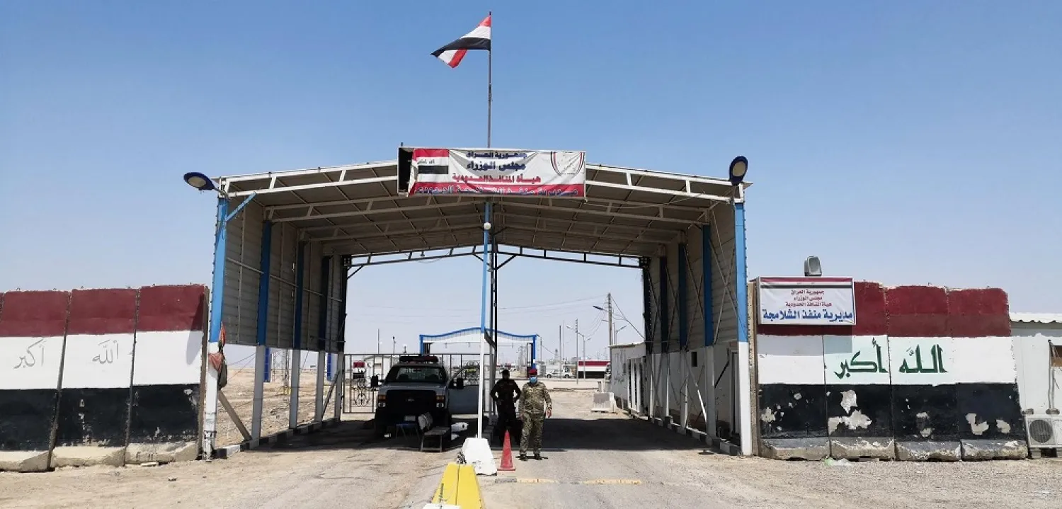 Iraqi Border Guards are seen at the border gate between Iraq and Iran after it partially reopened at the Shalamcheh Border Crossing, Iraq July 7, 2020. (Reuters)