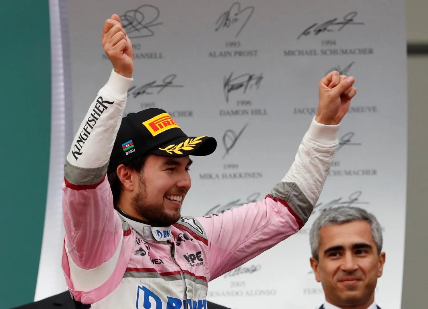 Formula One - F1 - Azerbaijan Grand Prix - Baku City Circuit, Baku, Azerbaijan - April 29, 2018 Force India's Sergio Perez celebrates on the podium after finishing third in the race REUTERS/David Mdzinarishvili