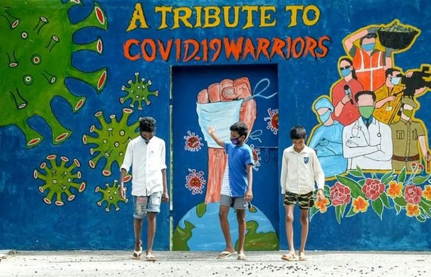 A mural dedicated to frontline workers fighting against the spread of the COVID-19 coronavirus, in Chennai

