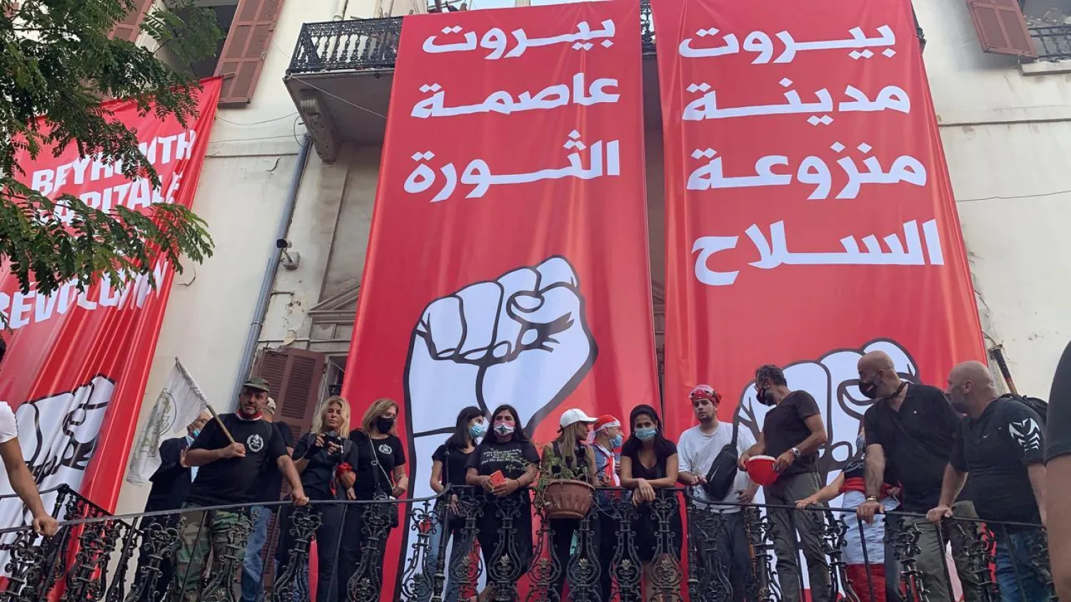 Demonstrators stand on the premises of Lebanese Foreign Ministry during a protest following Tuesday's blast, in Beirut, Lebanon August 8, 2020. (Reuters)