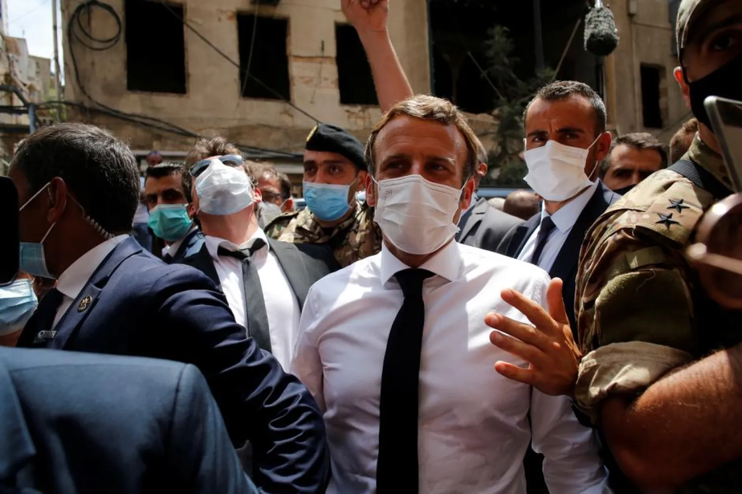 French President Emmanuel Macron visits a devastated street of Beirut, Lebanon August 6, 2020. Thibault Camus/Pool via REUTERS
