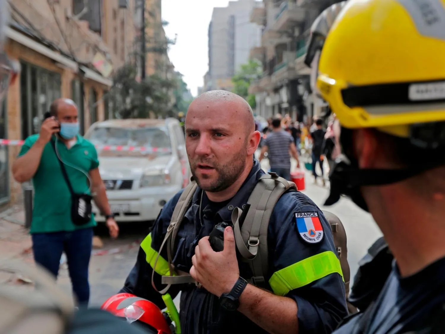French rescuers work in Beirut's Gemayzeh neighborhood, damaged by a blast in the Lebanese capital's port three days earlier, that ravaged entire neighborhoods and left scores of people dead or injured. AFP / JOSEPH EID