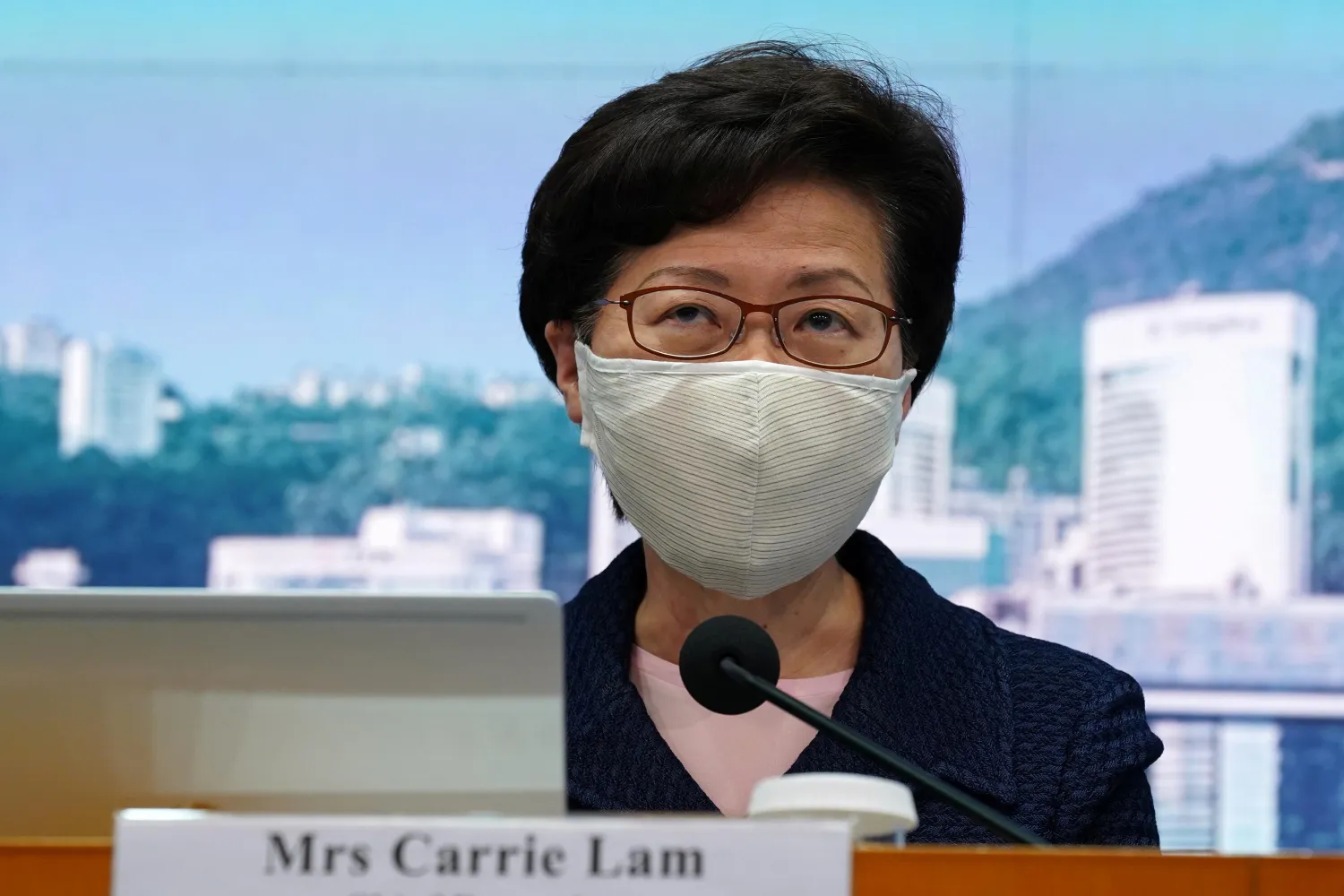 FILE PHOTO: Hong Kong Chief Executive Carrie Lam, wearing a face mask following the coronavirus disease (COVID-19) outbreak, attends a news conference in Hong Kong, China July 31, 2020. REUTERS/Lam Yik